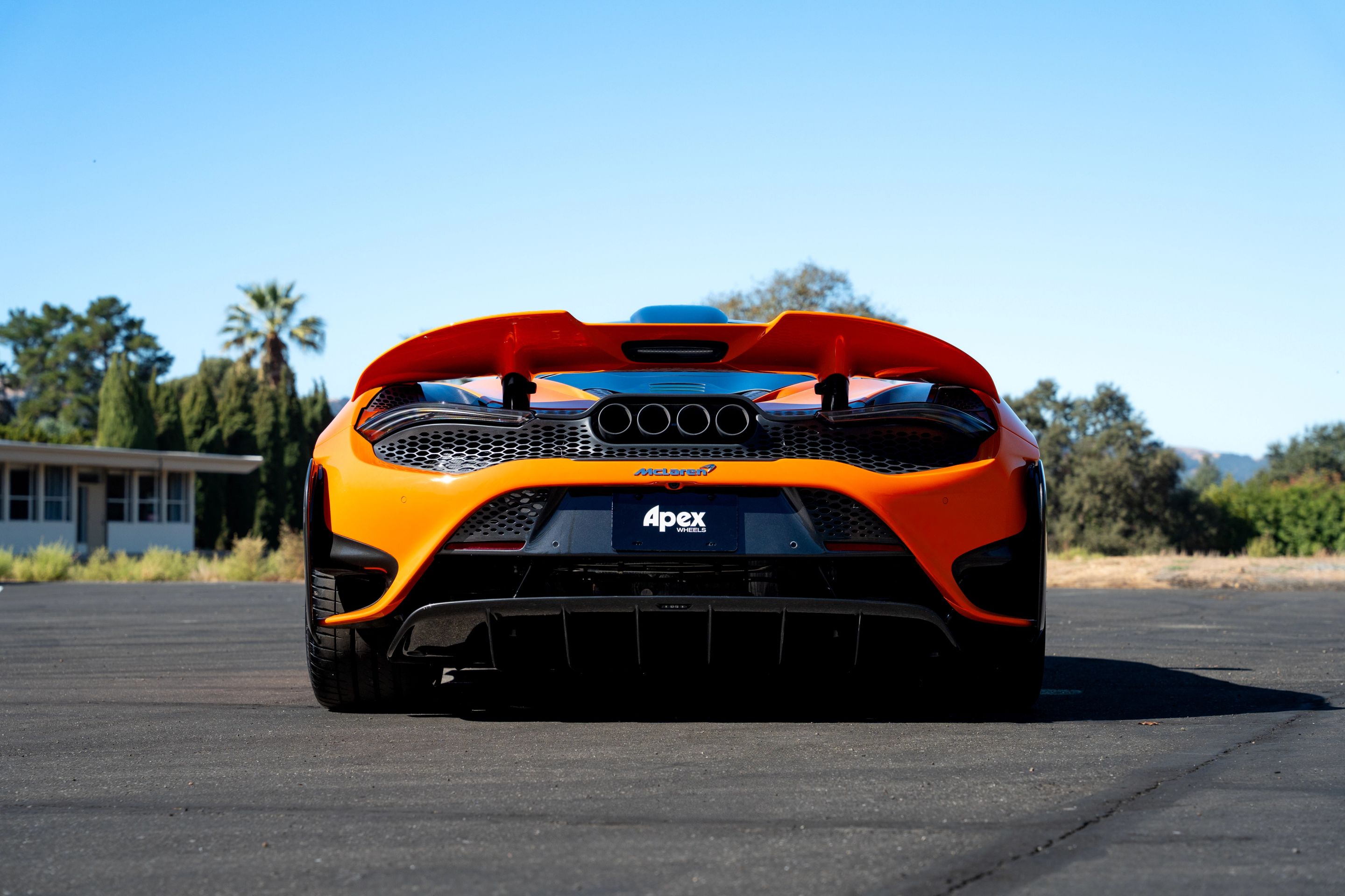 Orange McLaren 765LT with 19"/20" VS-5RS Apex wheels in Anthracite