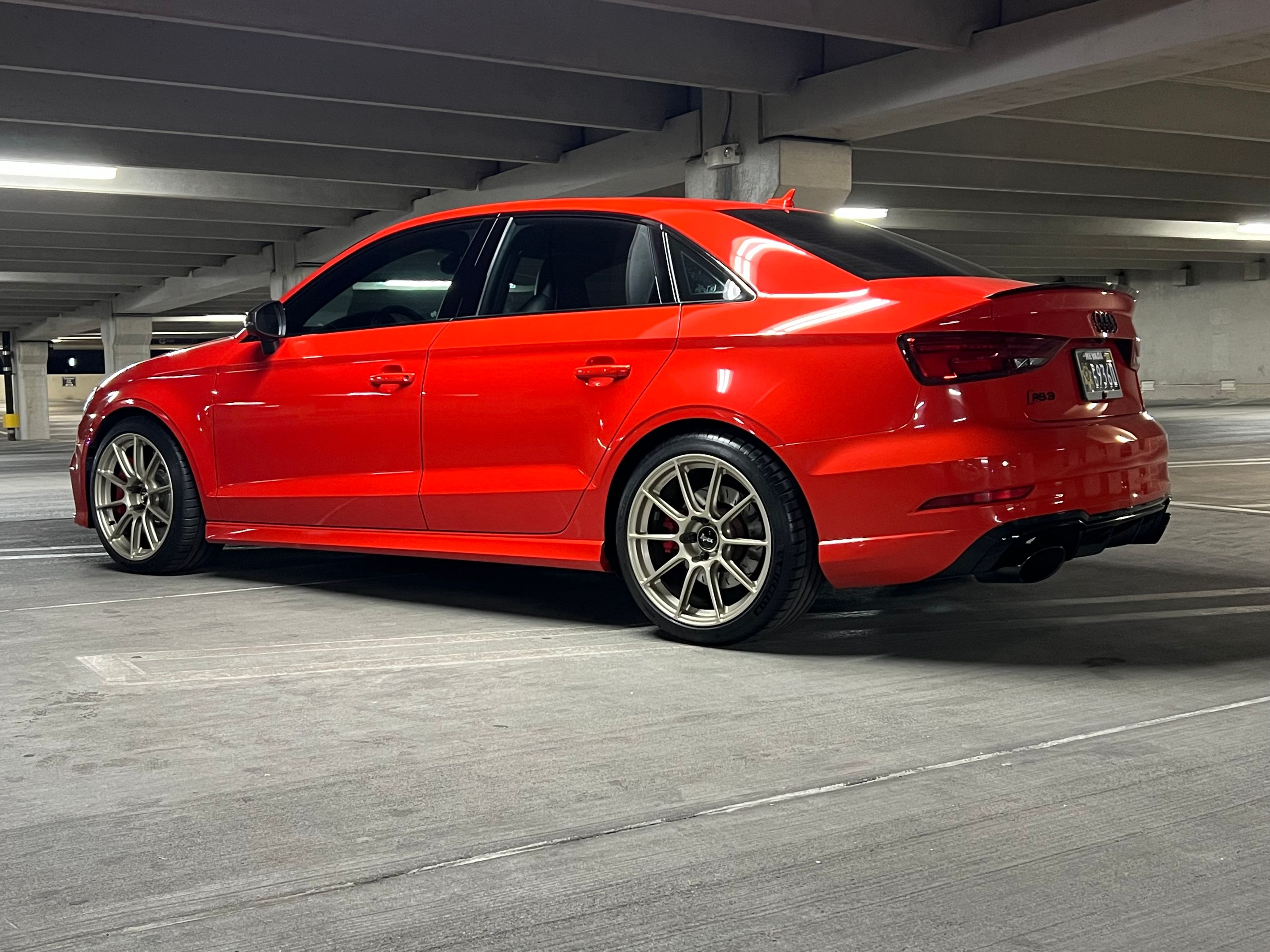 Red Audi 8V RS 3 with 18" SM-10RS Apex wheels in Motorsport Gold