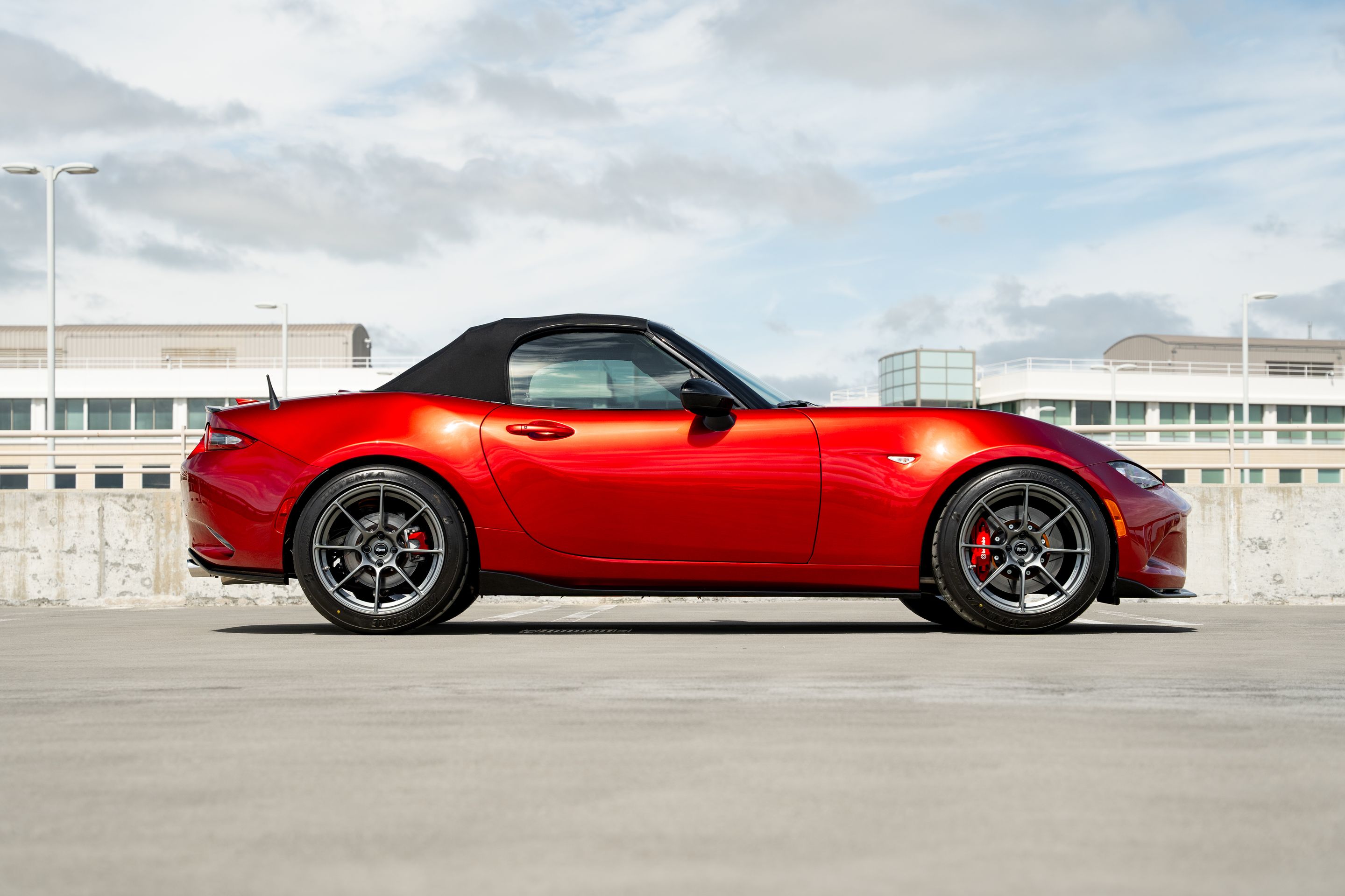 Red Mazda ND MX-5 Miata with 17" SM-8RS Apex wheels in Anthracite