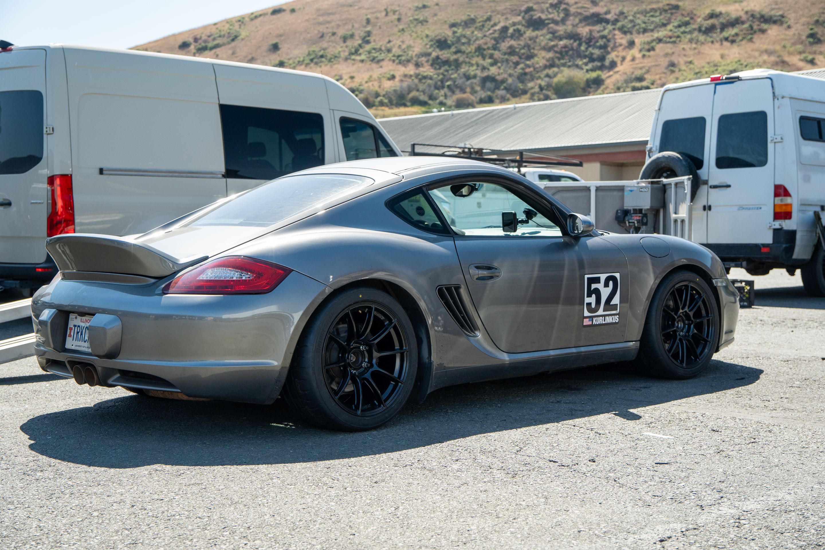 Grey Porsche 987 Cayman S with 18" SM-10RS Apex wheels in Satin Black