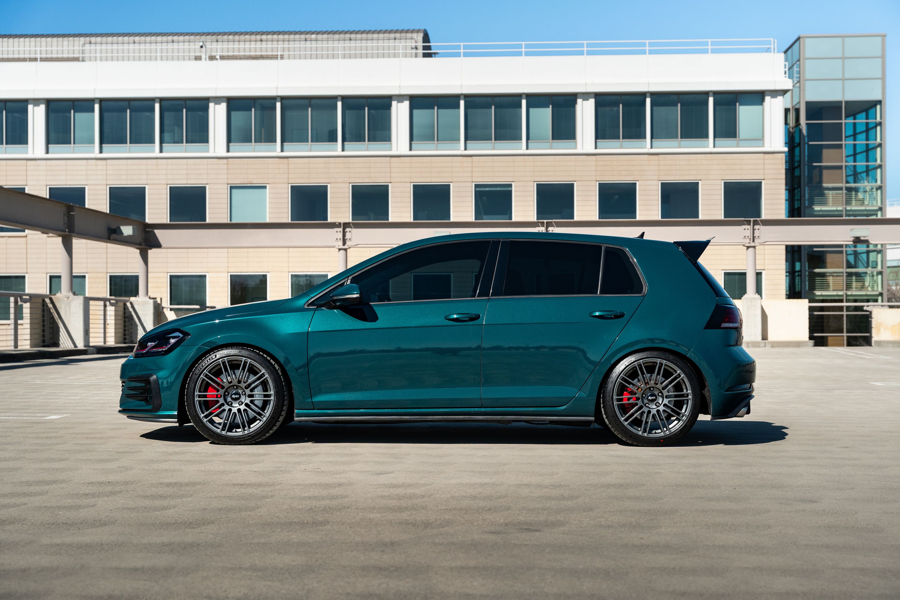 Green VW MK7 GTI with 18" TC-10RT Apex wheels in Anthracite