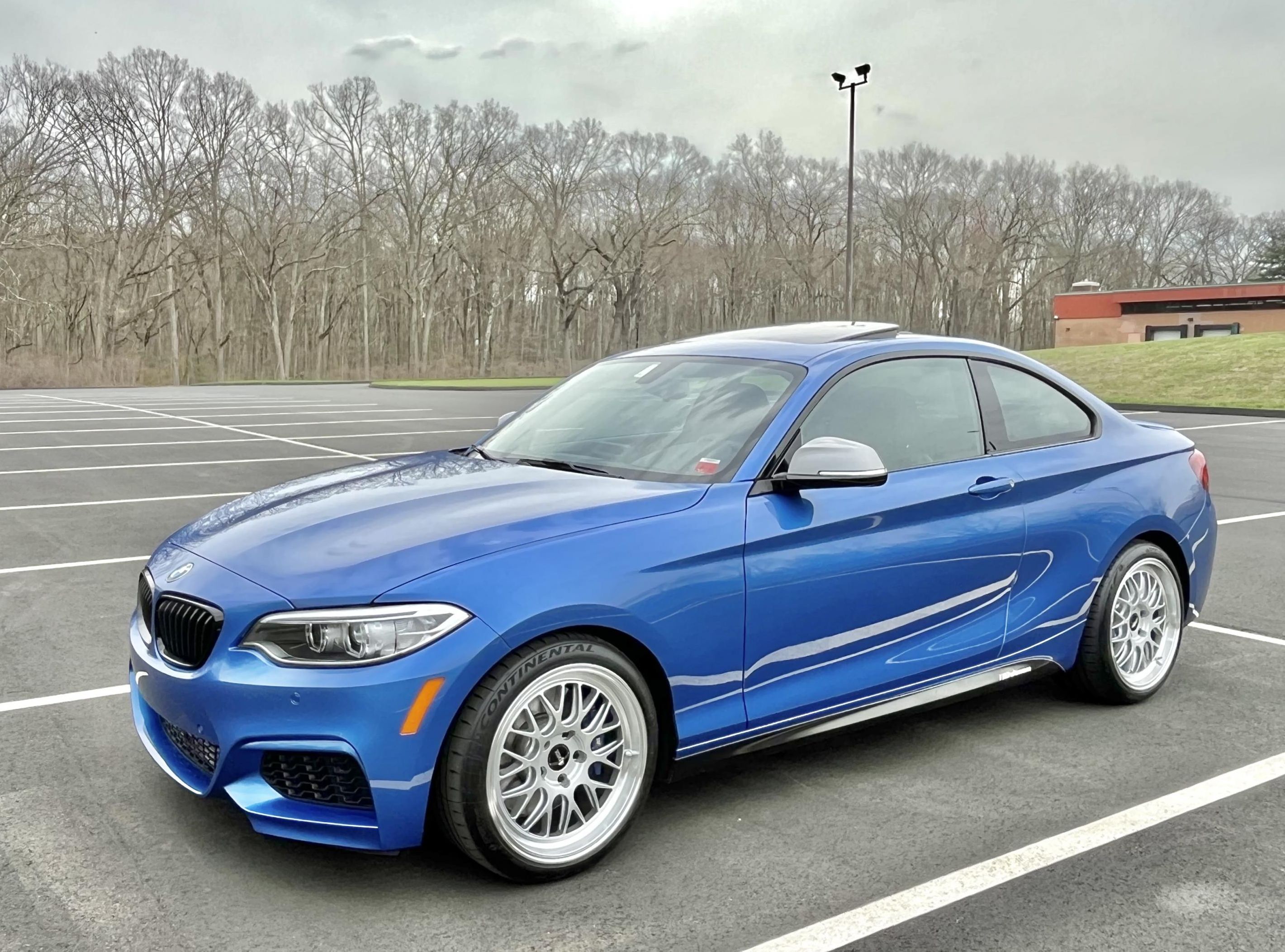 Blue BMW F22 Coupe 2 Series with 18" ML-10RT Apex wheels in Machined Lip Race Silver