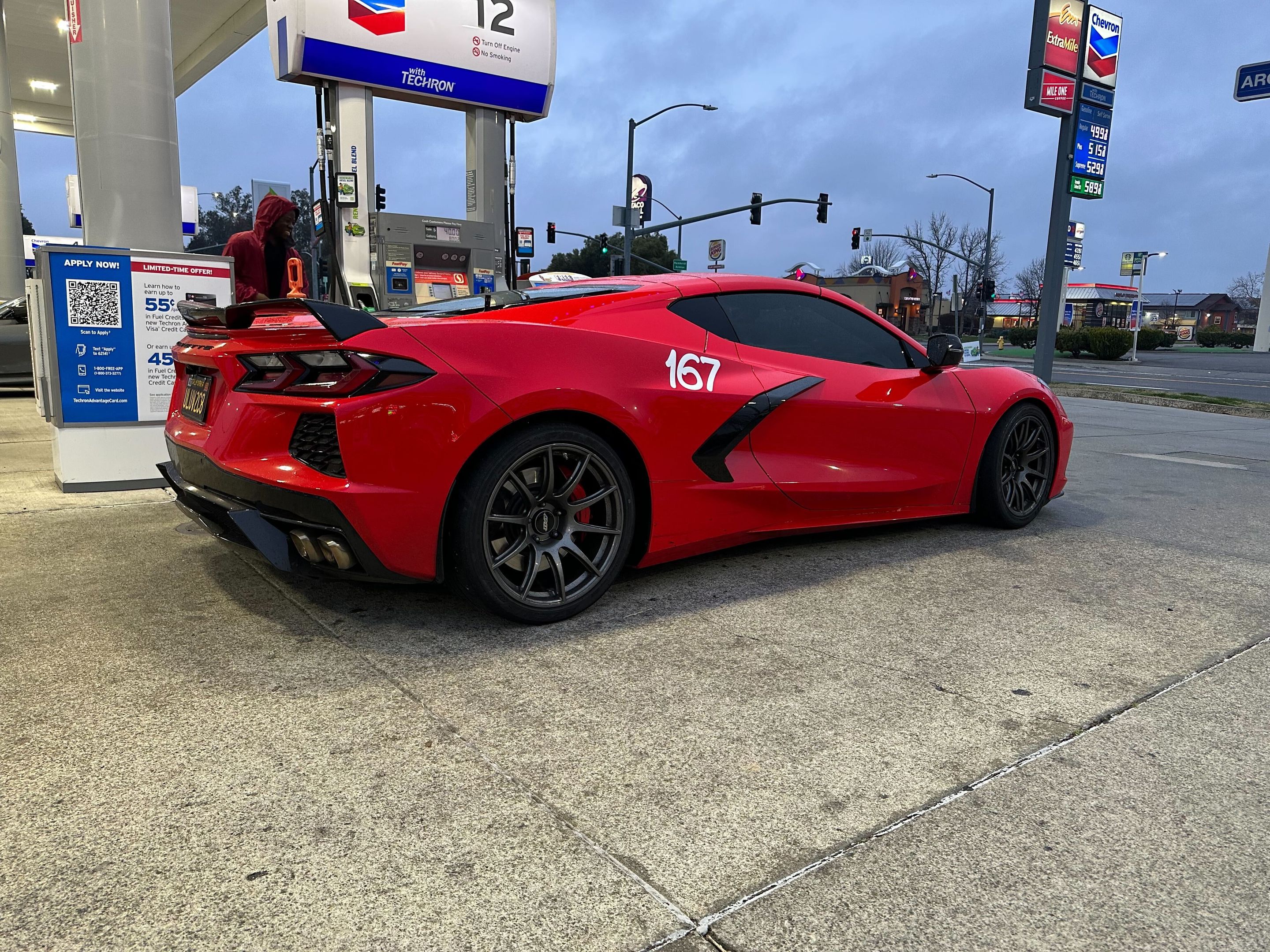 Red Chevrolet C8 Corvette Stingray/Z51 with 18"/19" SM-10 Apex wheels in Anthracite