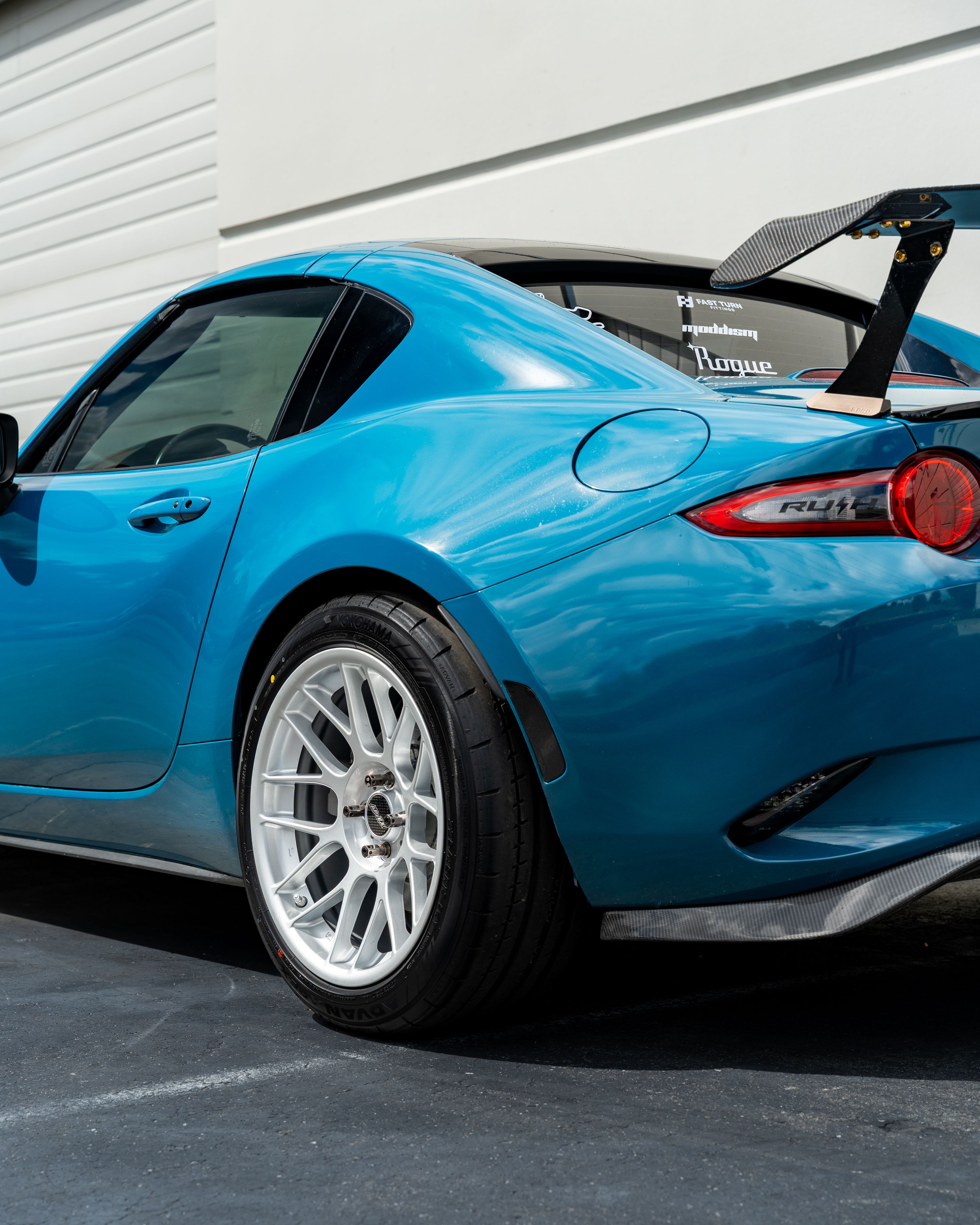 Blue Mazda ND MX-5 Miata with 17" ARC-8 Apex wheels in Race Silver