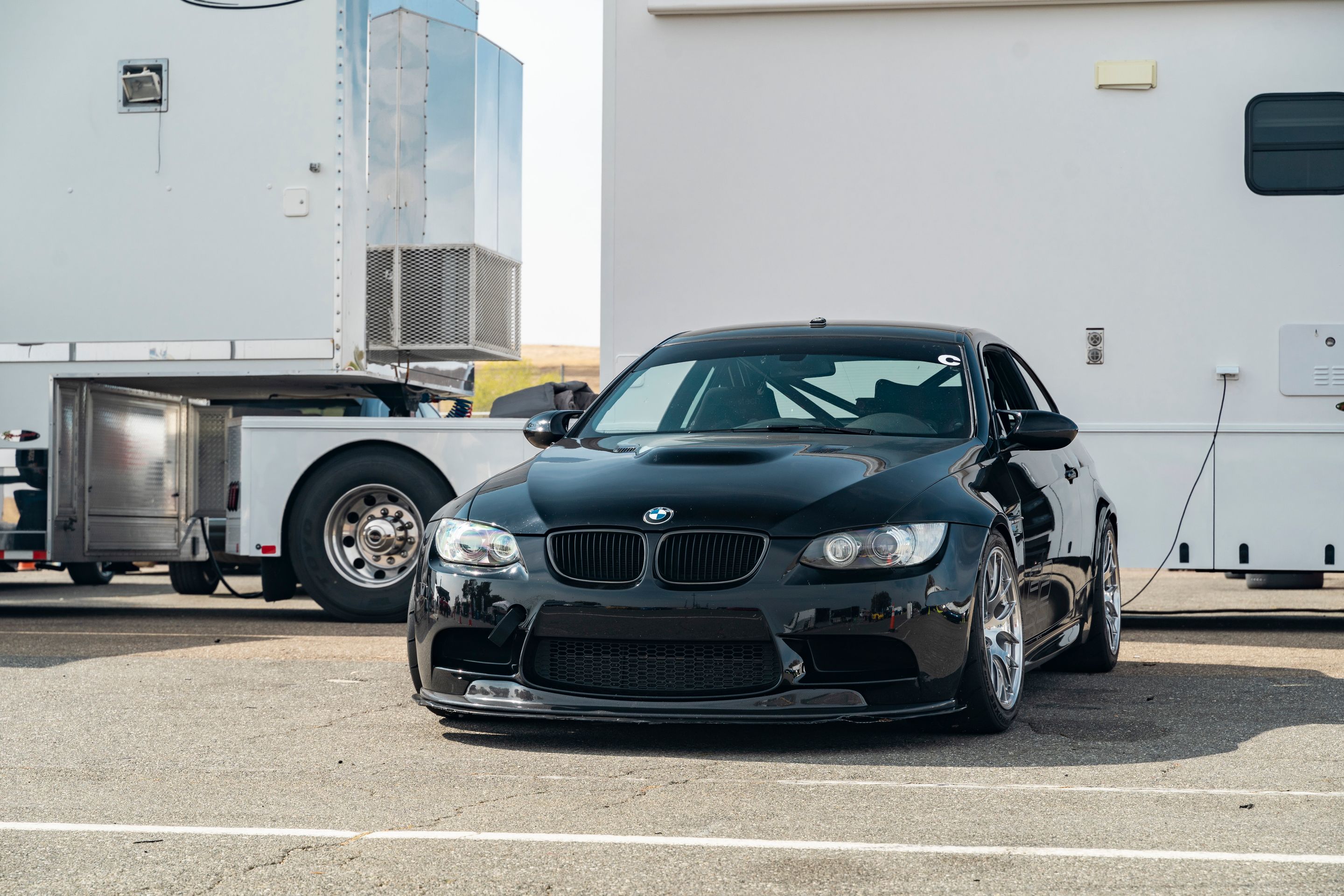 Black BMW E92 Coupe M3 with 18" EC-7R Apex wheels in Brushed Clear