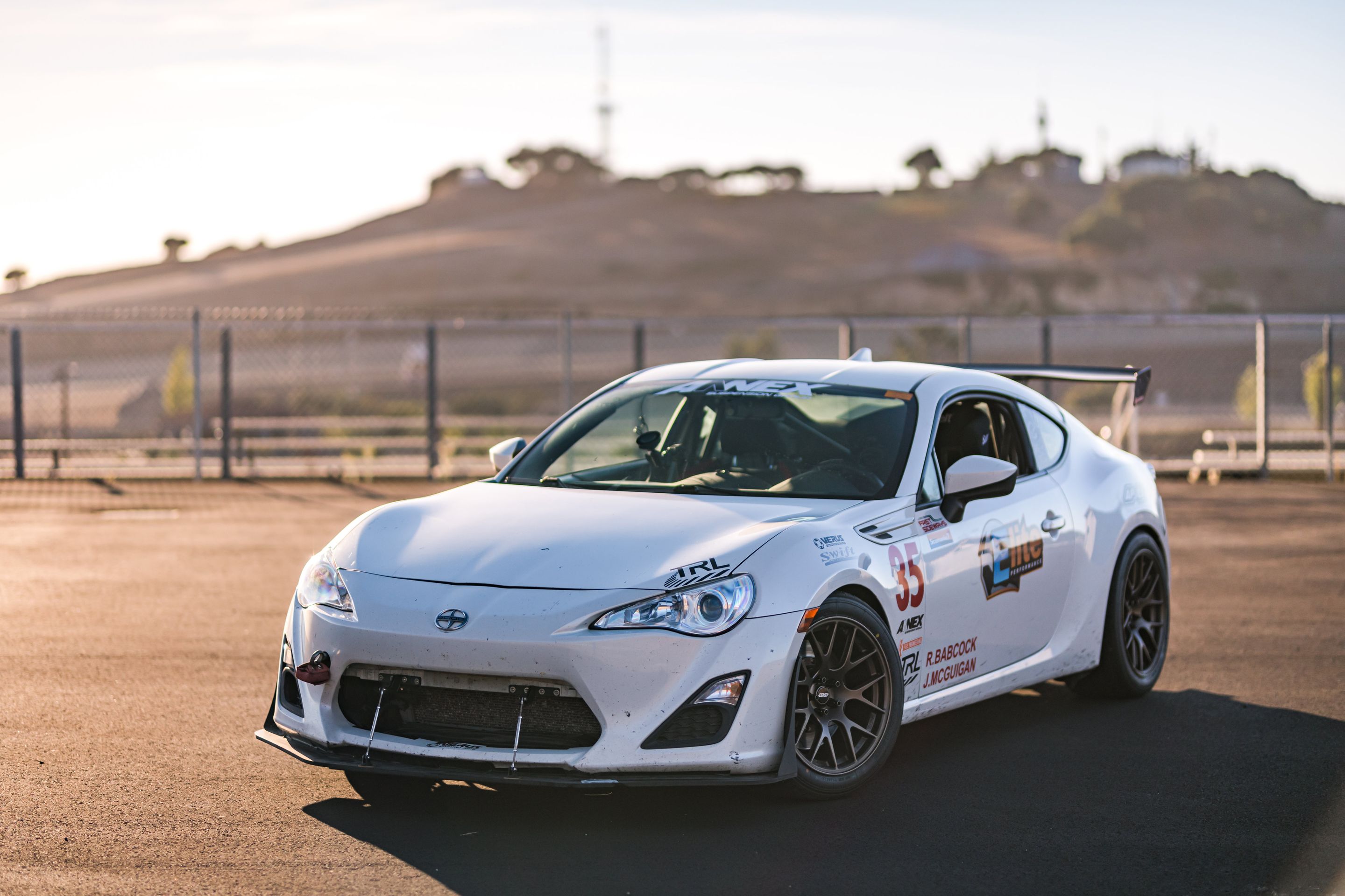 White Scion FR-S with 17" EC-7R Apex wheels in Satin Bronze