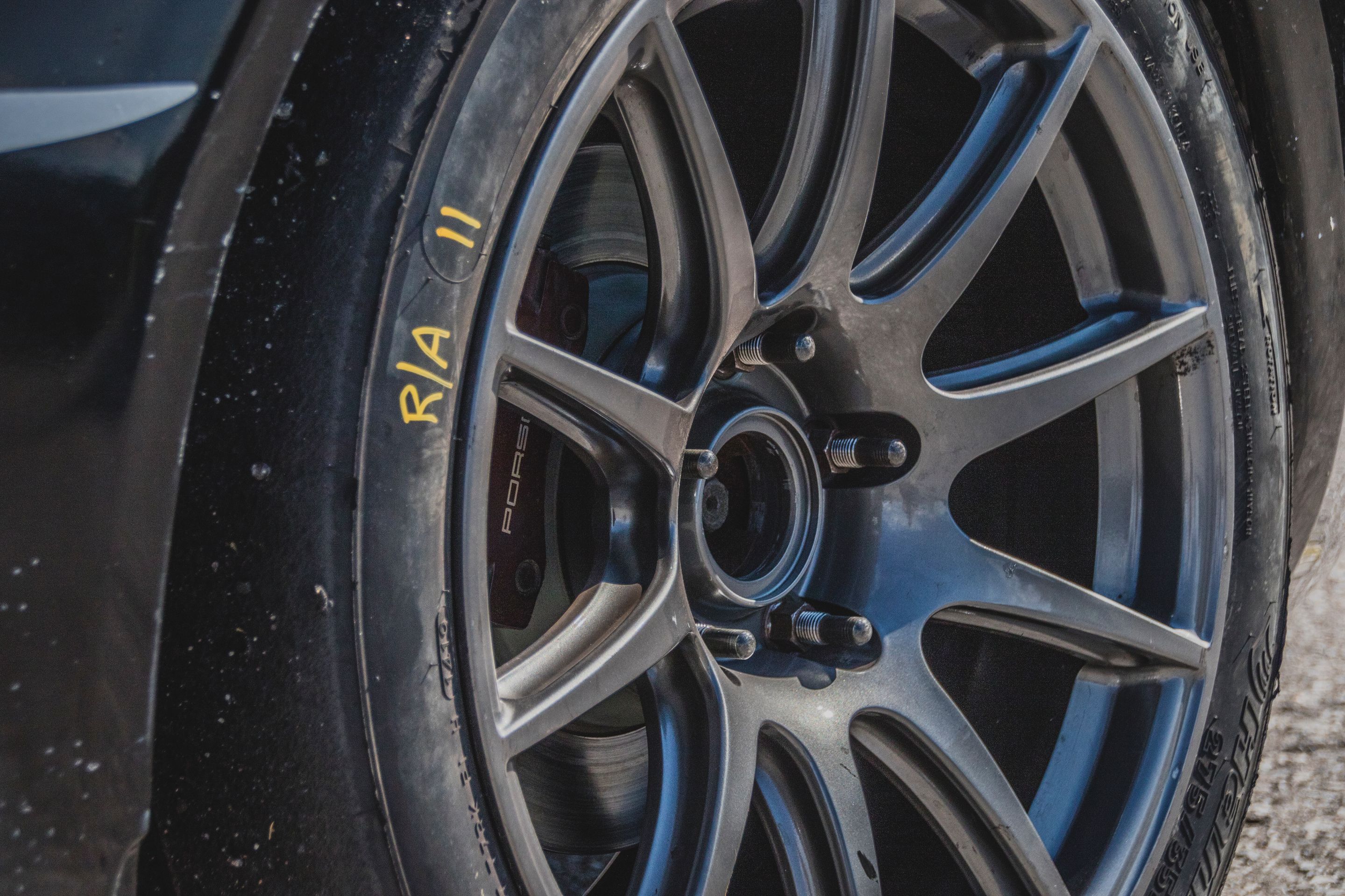Black Porsche 987 Spec Cayman (SPC) with 18" SM-10 Apex wheels in Anthracite