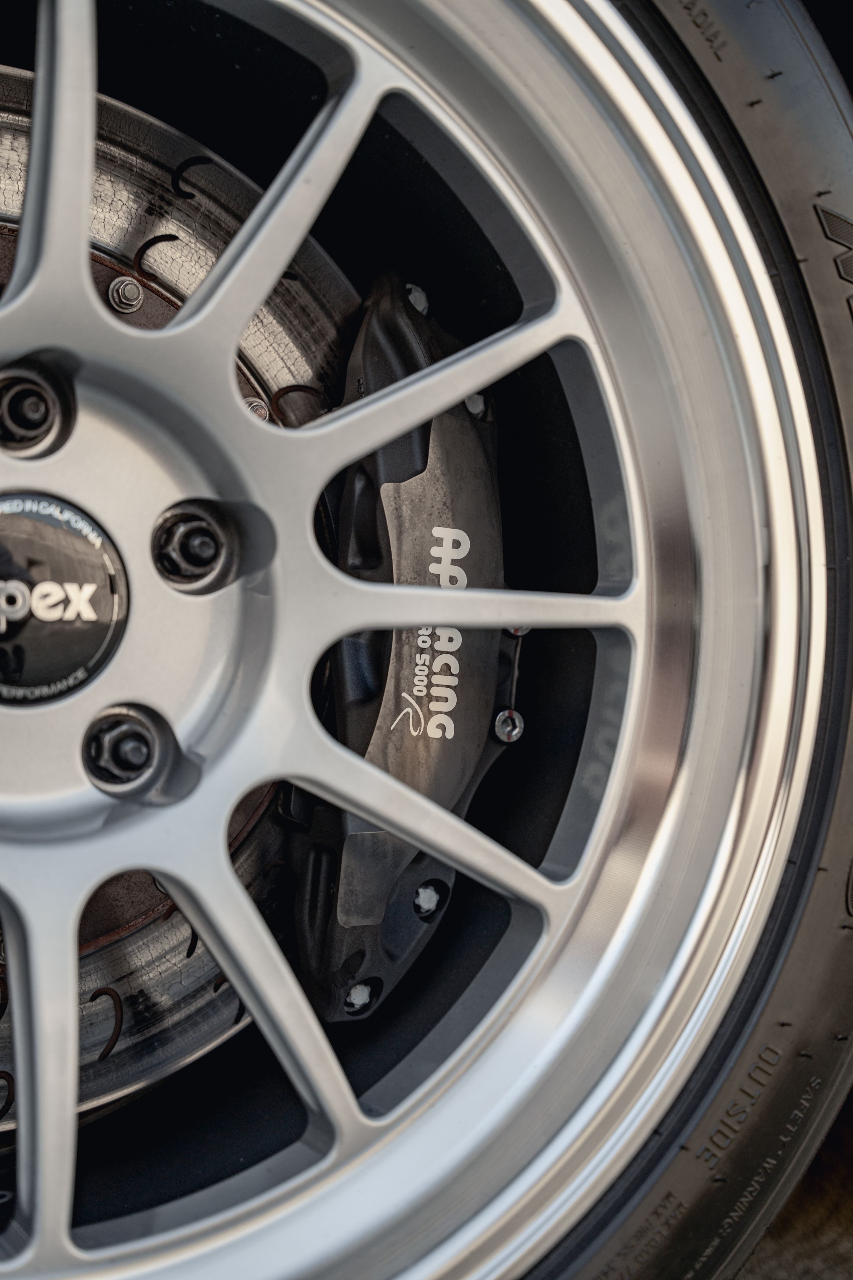 White BMW E92 Coupe M3 with 18" SL-12 Apex wheels in Machined Lip Race Silver