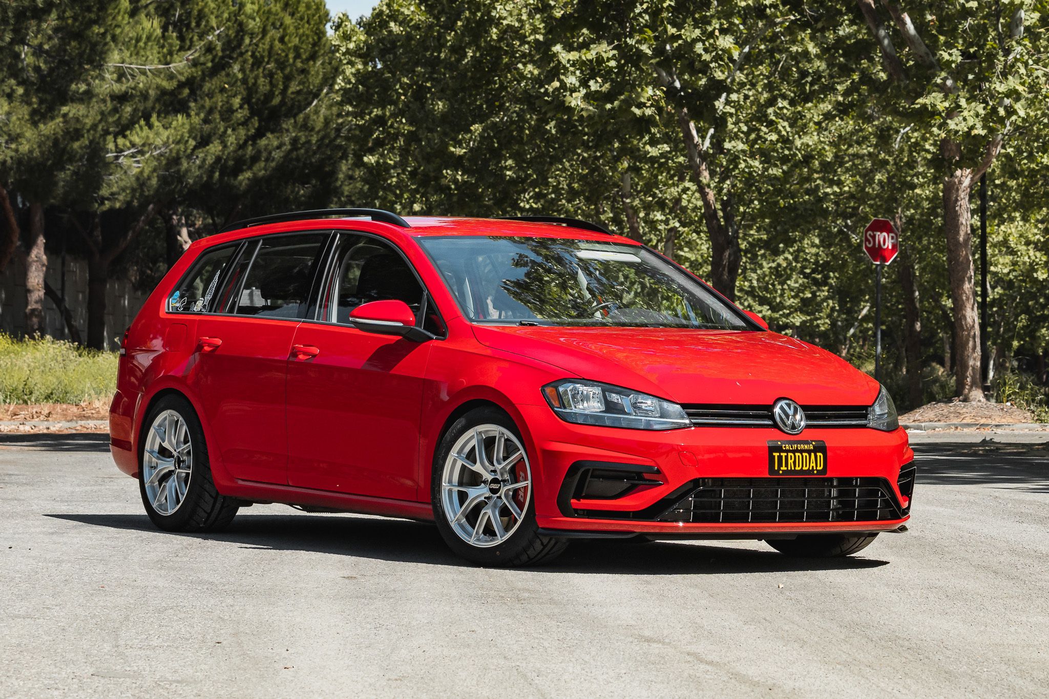Red VW MK7 Alltrack/SportWagen Golf SportWagen with 17" VS-5RS Apex wheels in Brushed Clear