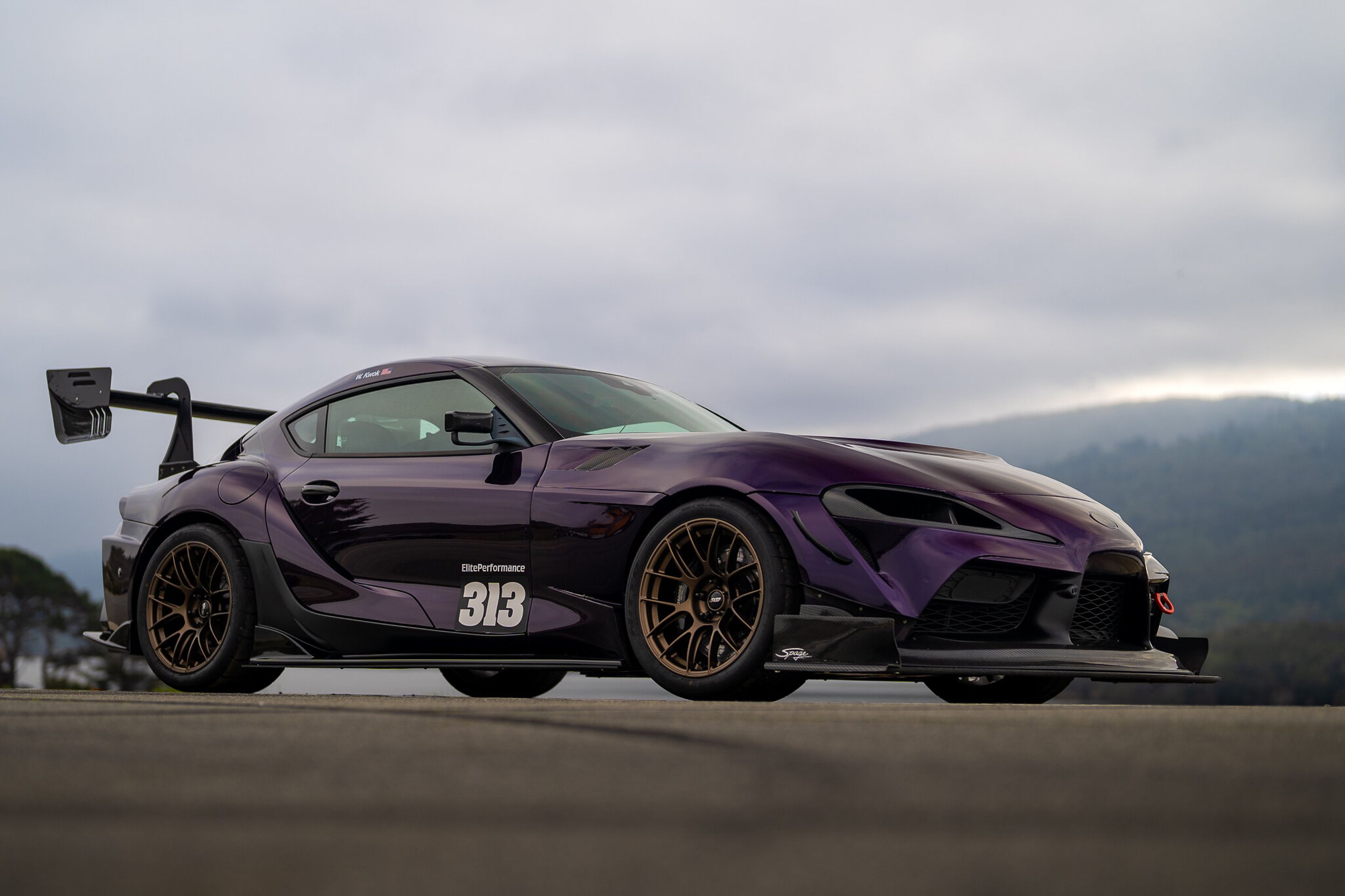 Purple Toyota GR Supra with 18" EC-7RS Apex wheels in Satin Bronze