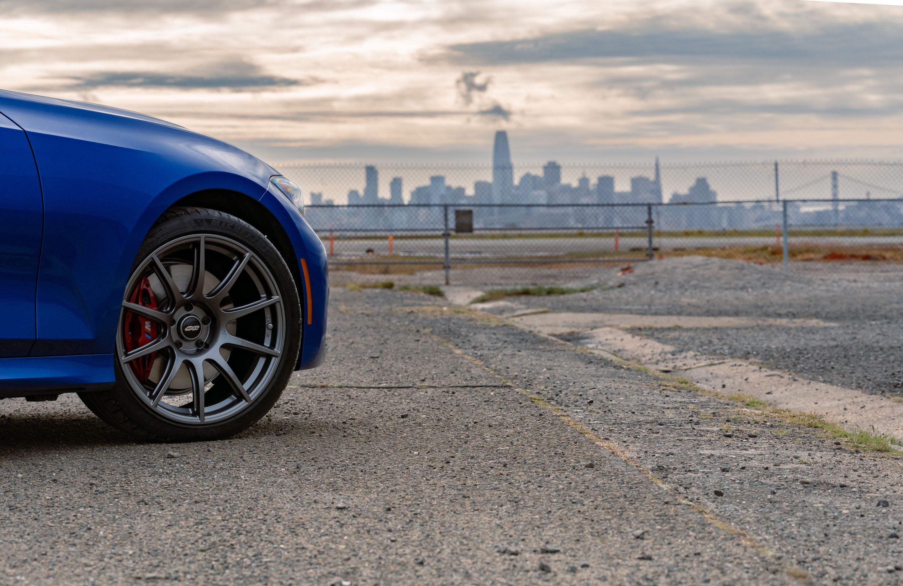 Blue BMW G20 Sedan 3 Series with 19" SM-10 Apex wheels in Anthracite