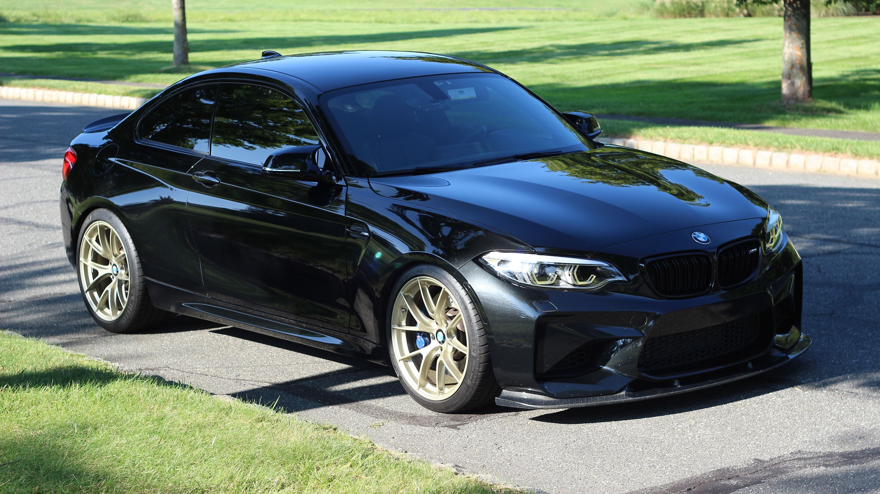 Black BMW F87 M2 with 19" VS-5RS Apex wheels in Motorsport Gold
