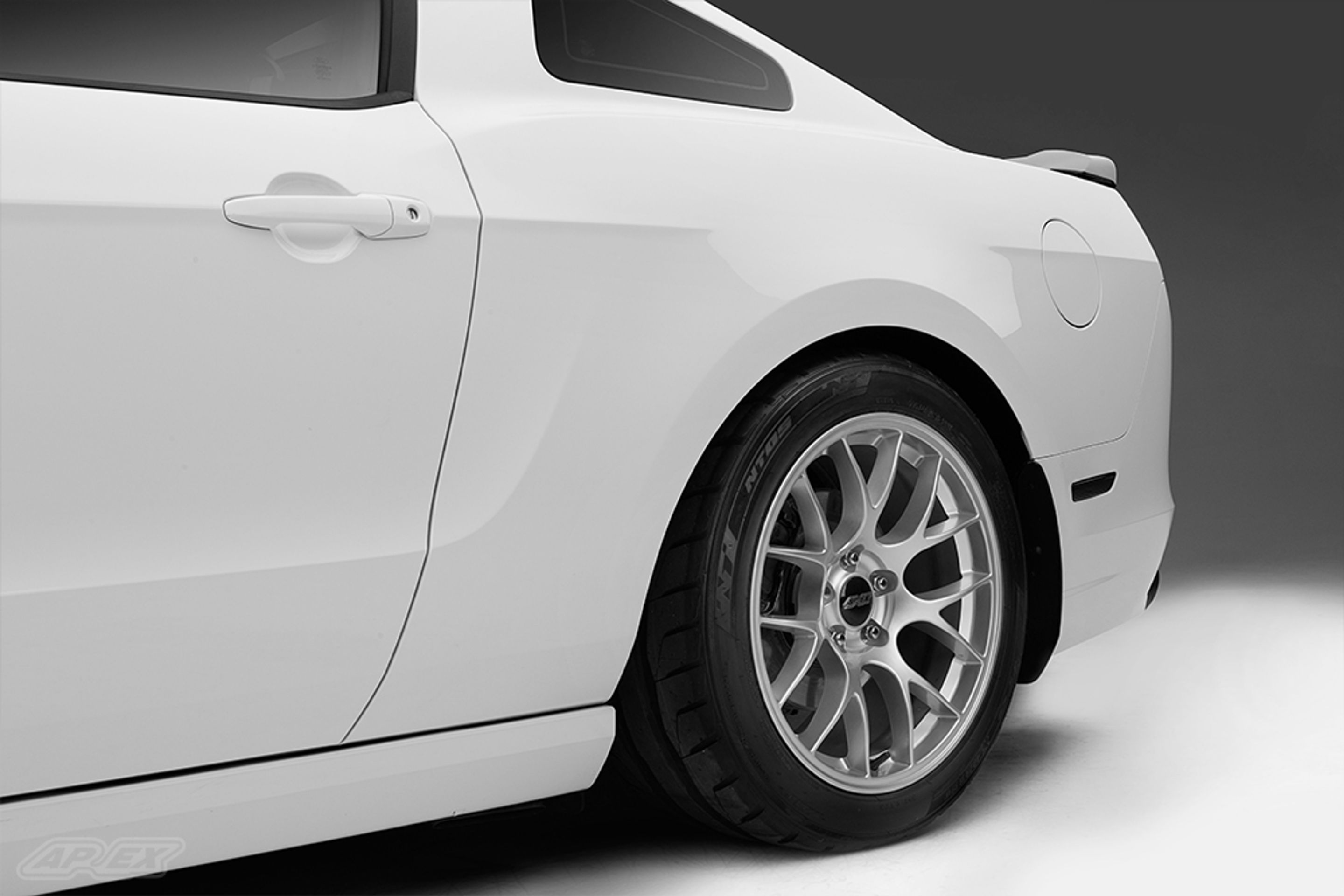 White Ford S197 Mustang GT with 18" EC-7 Apex wheels in Race Silver