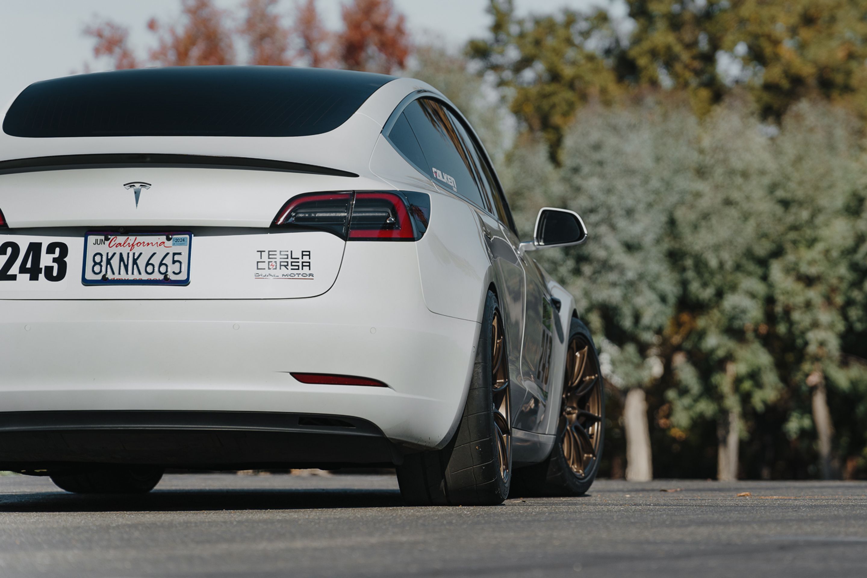 White Tesla Model 3 with 19" SM-10RS Apex wheels in Satin Bronze