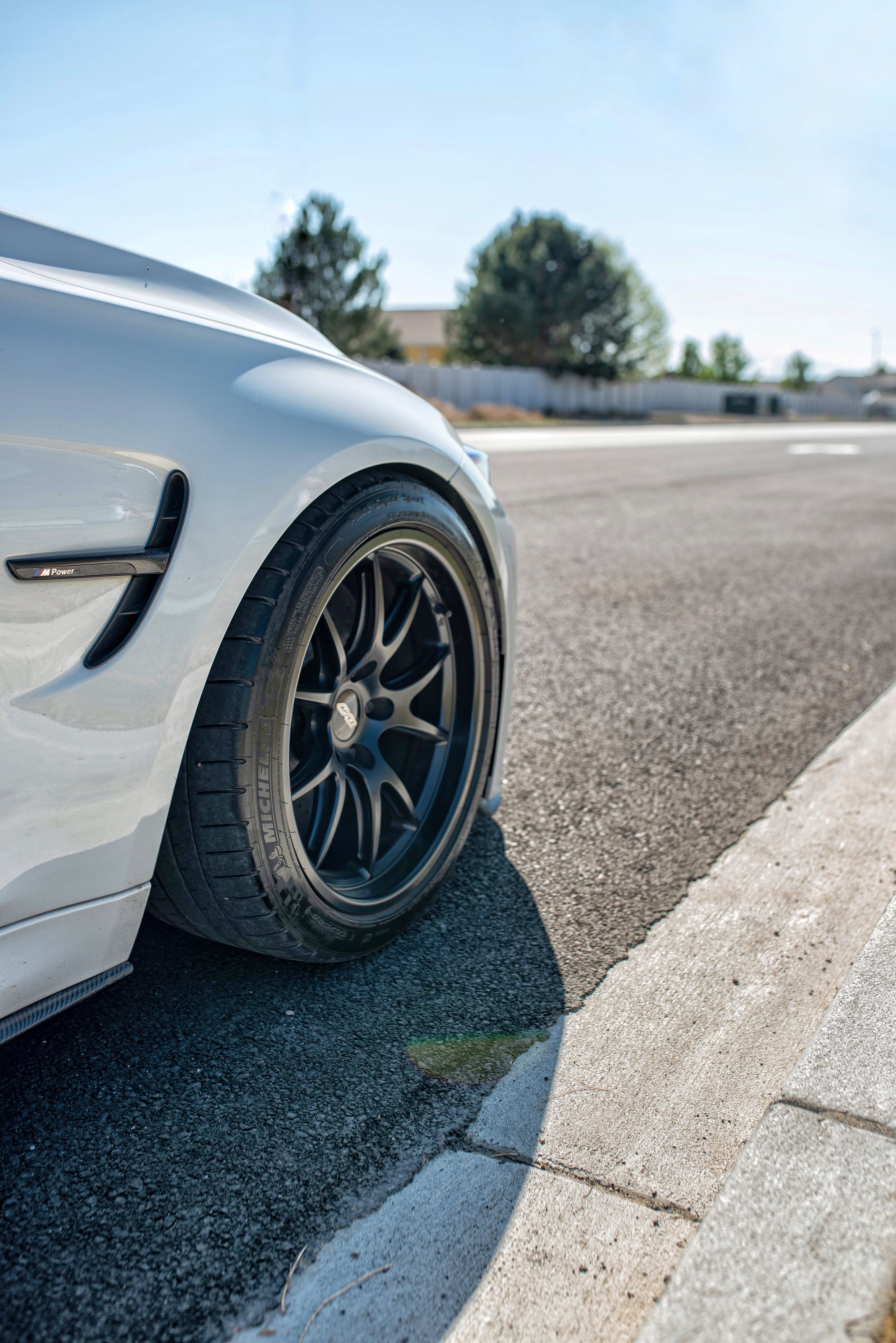 White BMW F80 M3 with 18" FL-5 Apex wheels in Satin Black