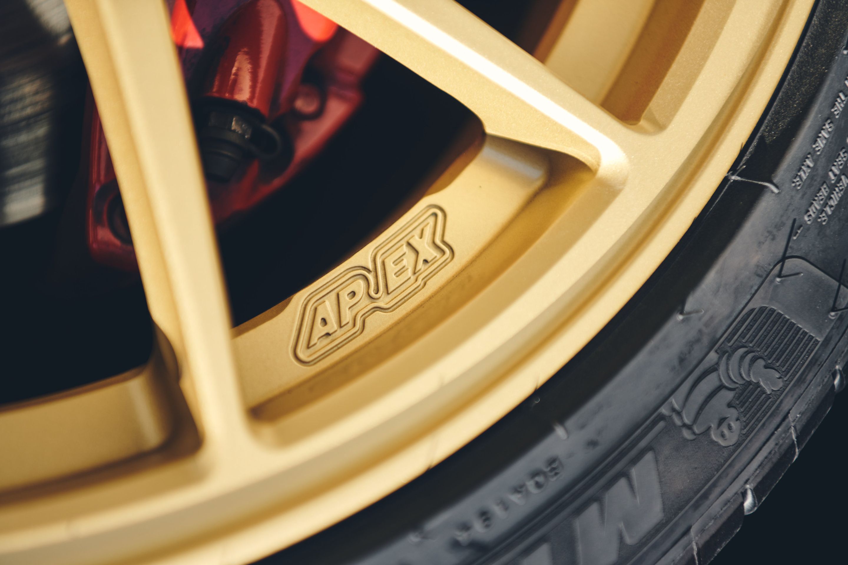 Blue Subaru ZC6 / Gen 1 BRZ with 17" EC-7R Apex wheels in Satin Gold