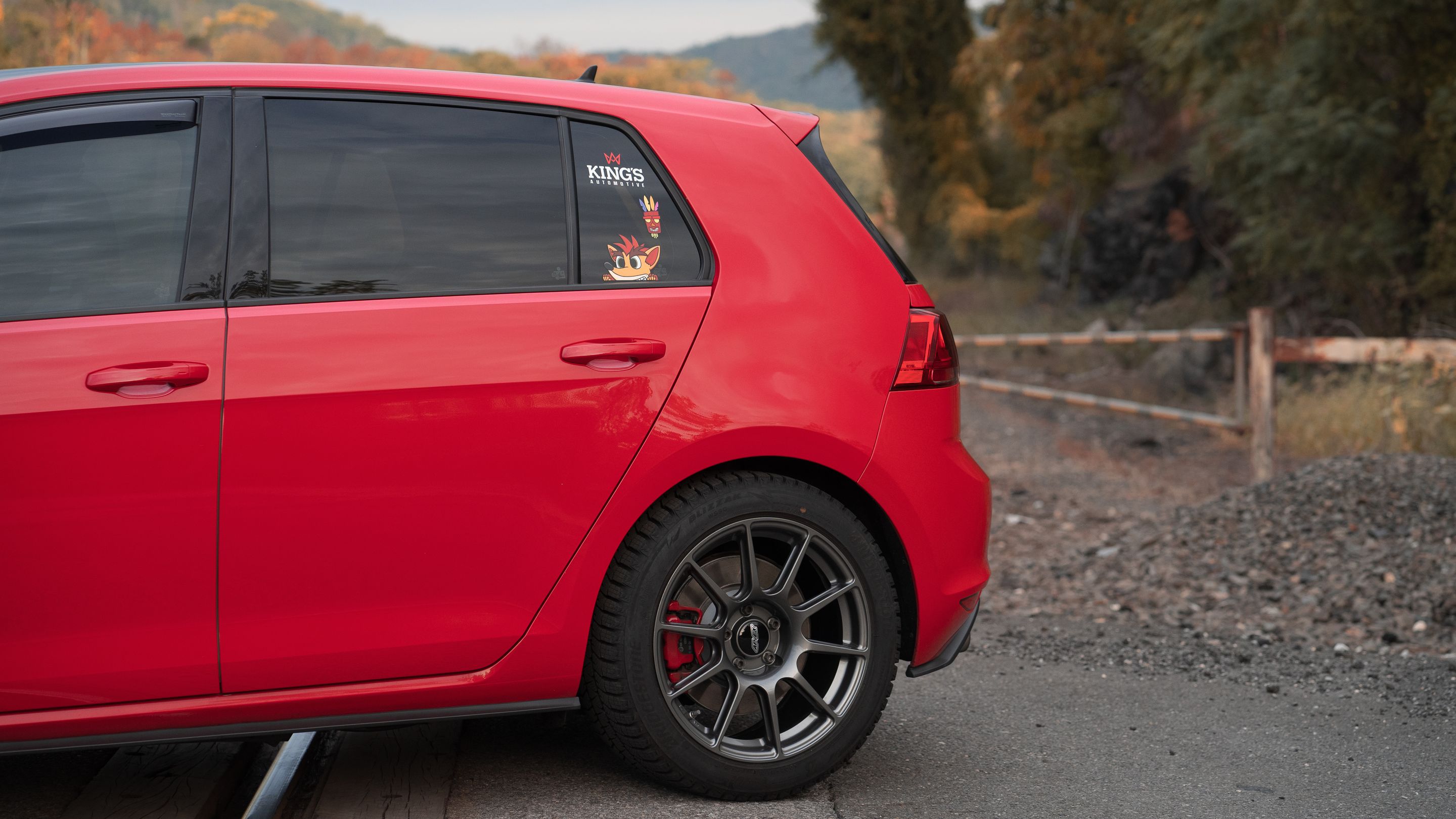 Red VW MK7 GTI with 17" SM-10 Apex wheels in Anthracite