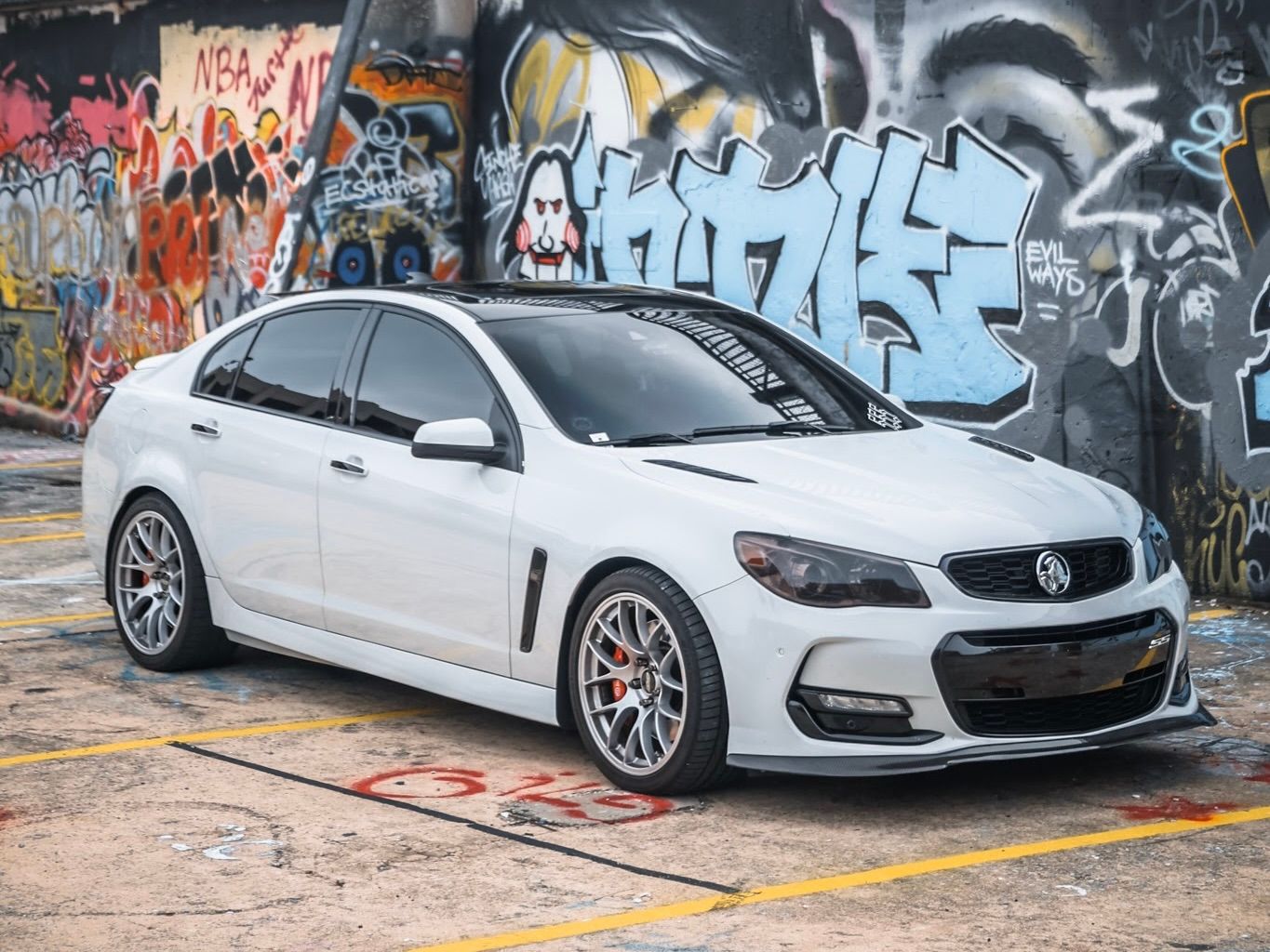 White Chevrolet SS with 19" EC-7 Apex wheels in Race Silver