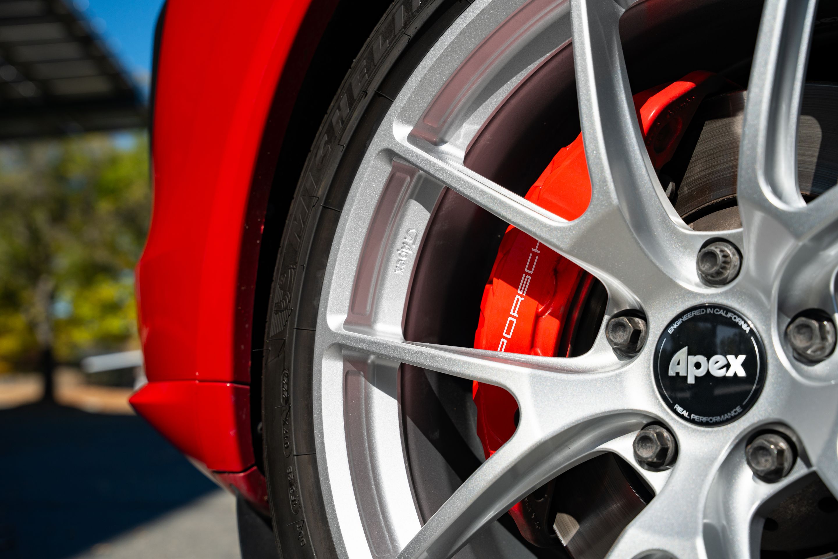 Red Porsche 958 Cayenne with 21" VS-5RX Apex wheels in Race Silver