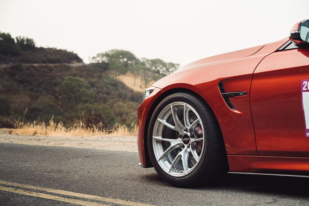 Orange BMW F82 Coupe M4 with 18" VS-5RS Apex wheels in Brushed Clear