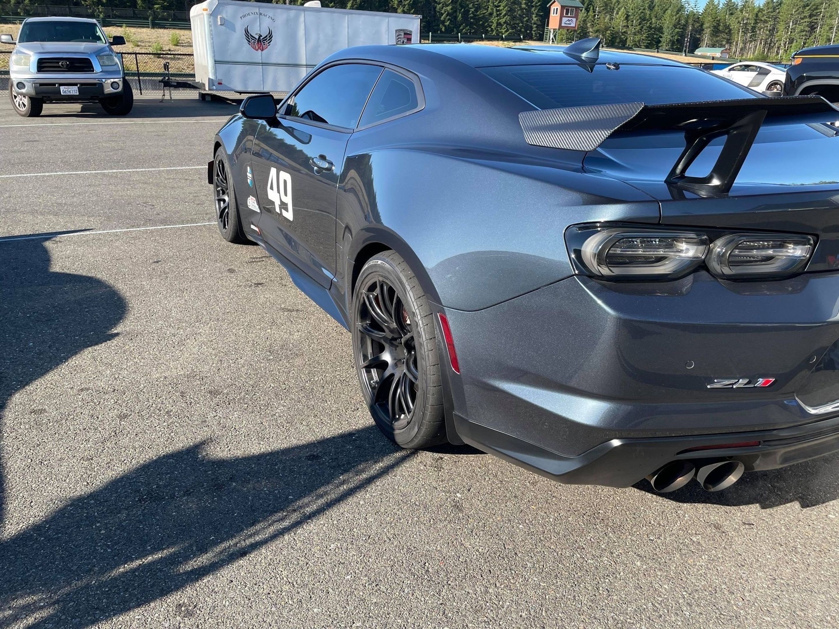 Grey Chevrolet 6th Gen Camaro ZL1 1LE with 19" SM-10 Apex wheels in Satin Black
