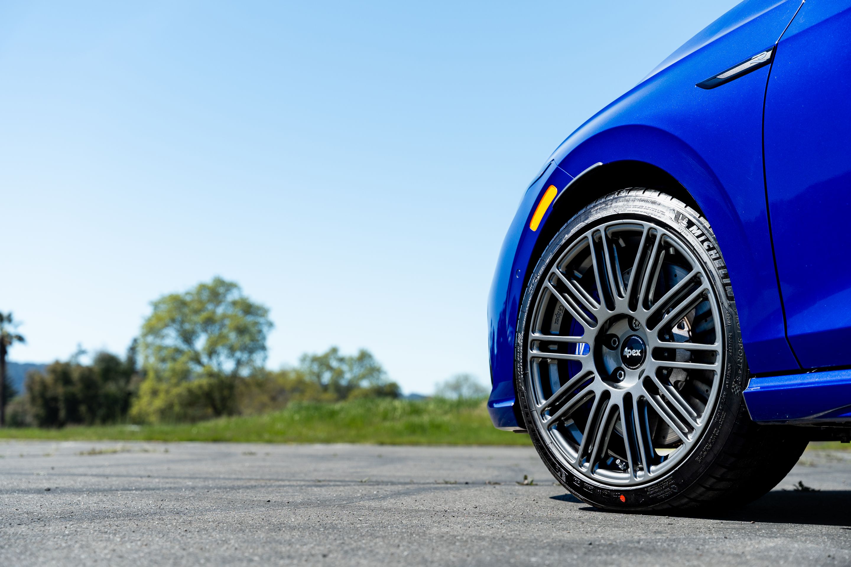 Blue VW MK8 Golf R with 18" TC-10RT Apex wheels in Anthracite