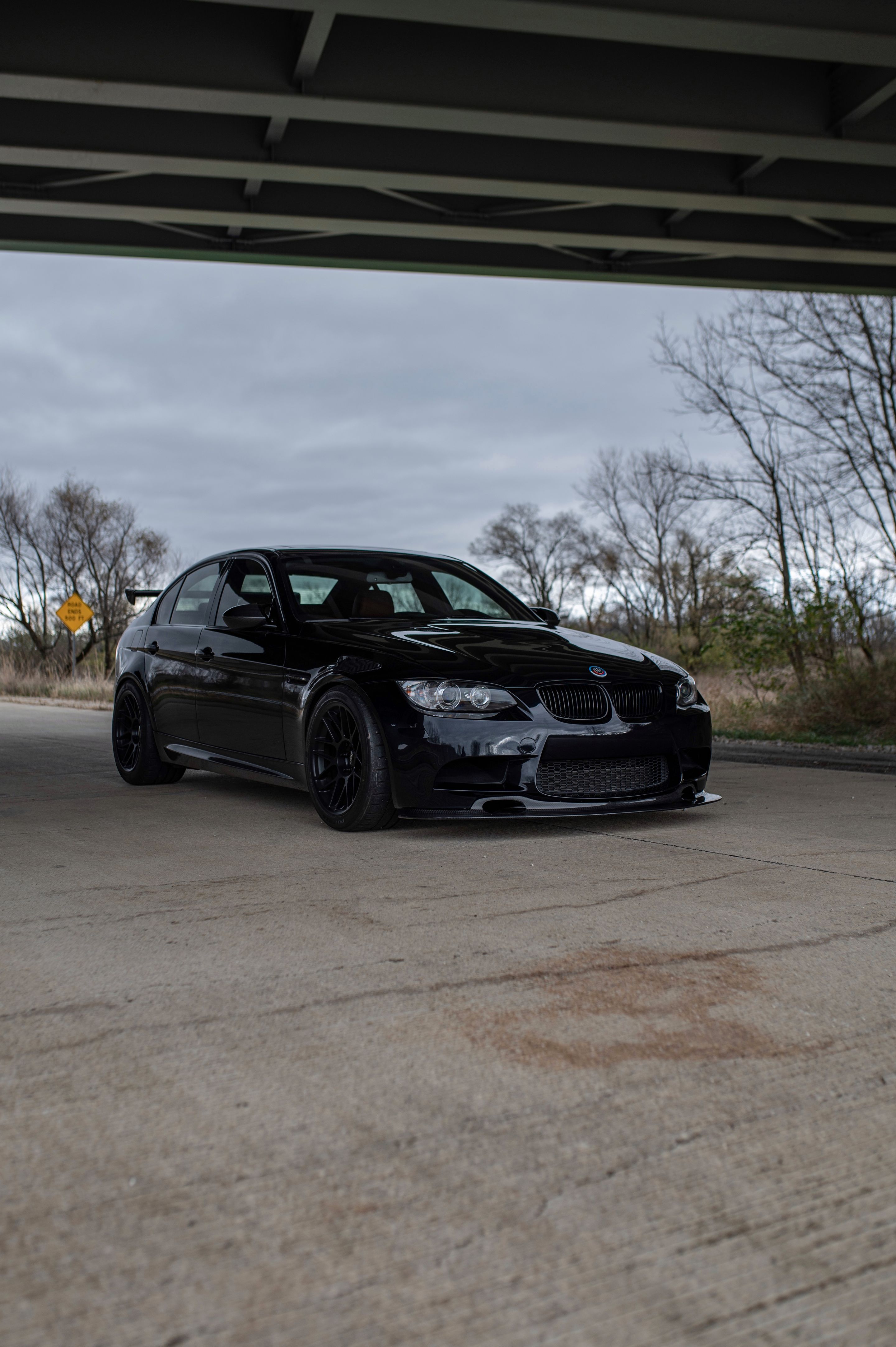 Black BMW E90 Sedan M3 with 18" ARC-8 Apex wheels in Satin Black