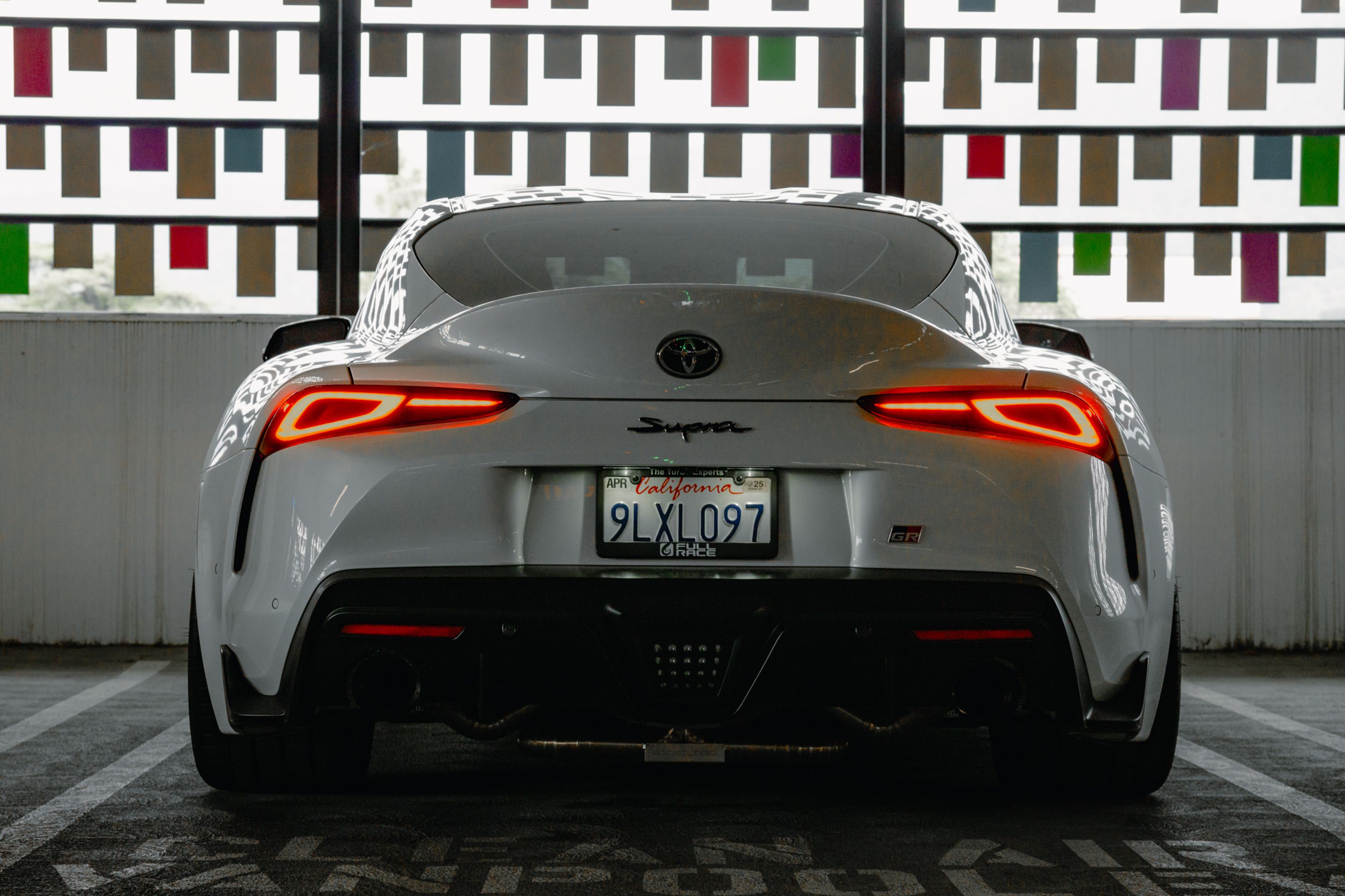 White Toyota GR Supra with 19" VS-5RS Apex wheels in Satin Bronze