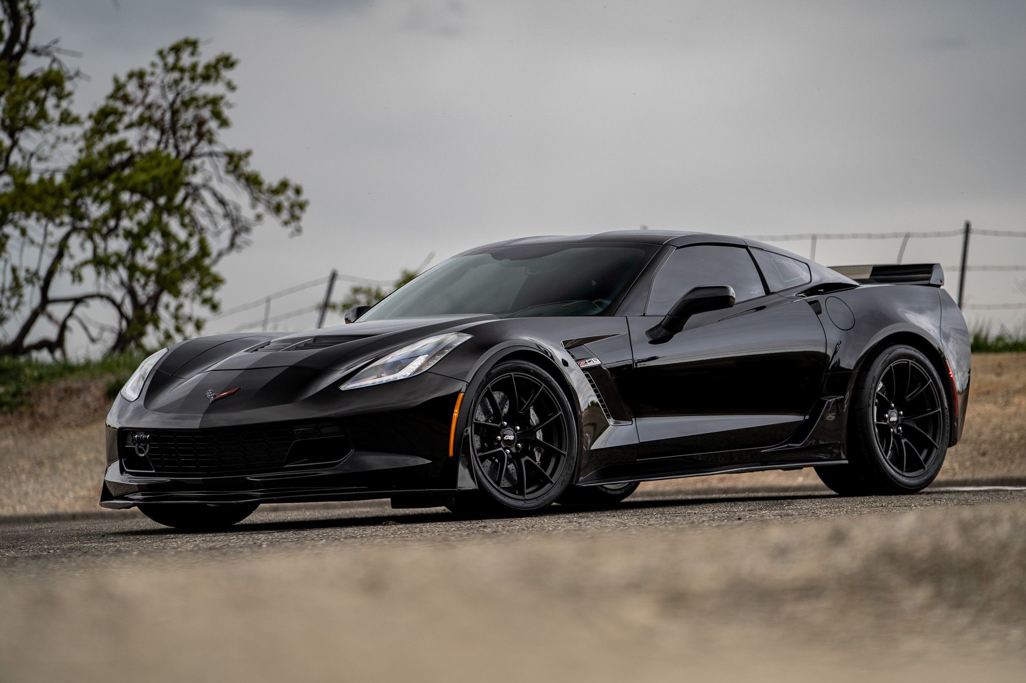 Black Chevrolet C7 Corvette Z06 with 19" VS-5RS Apex wheels in Satin Black