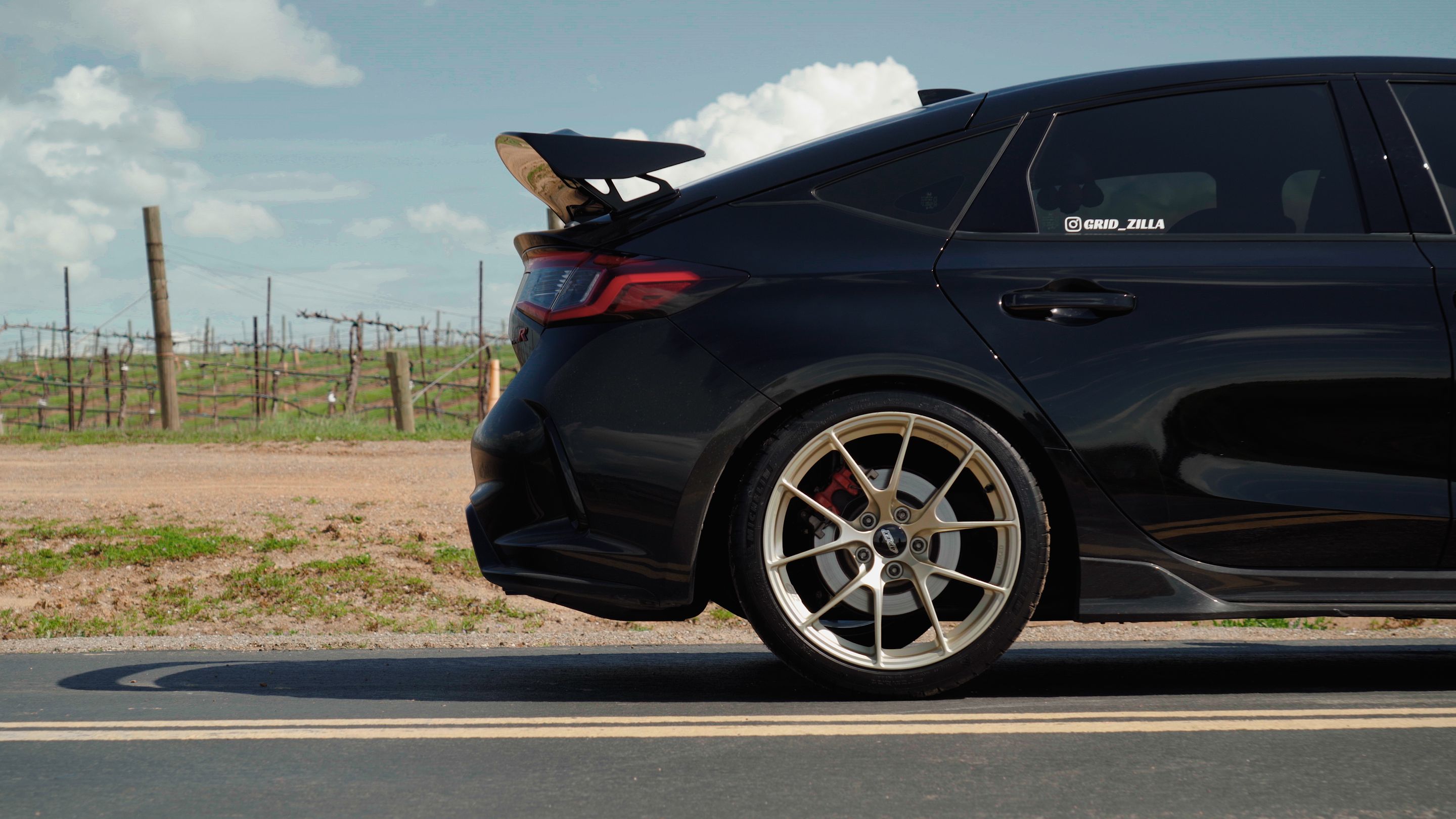 Black Honda FL5 Civic Type-R with 19" VS-5RS Apex wheels in Motorsport Gold