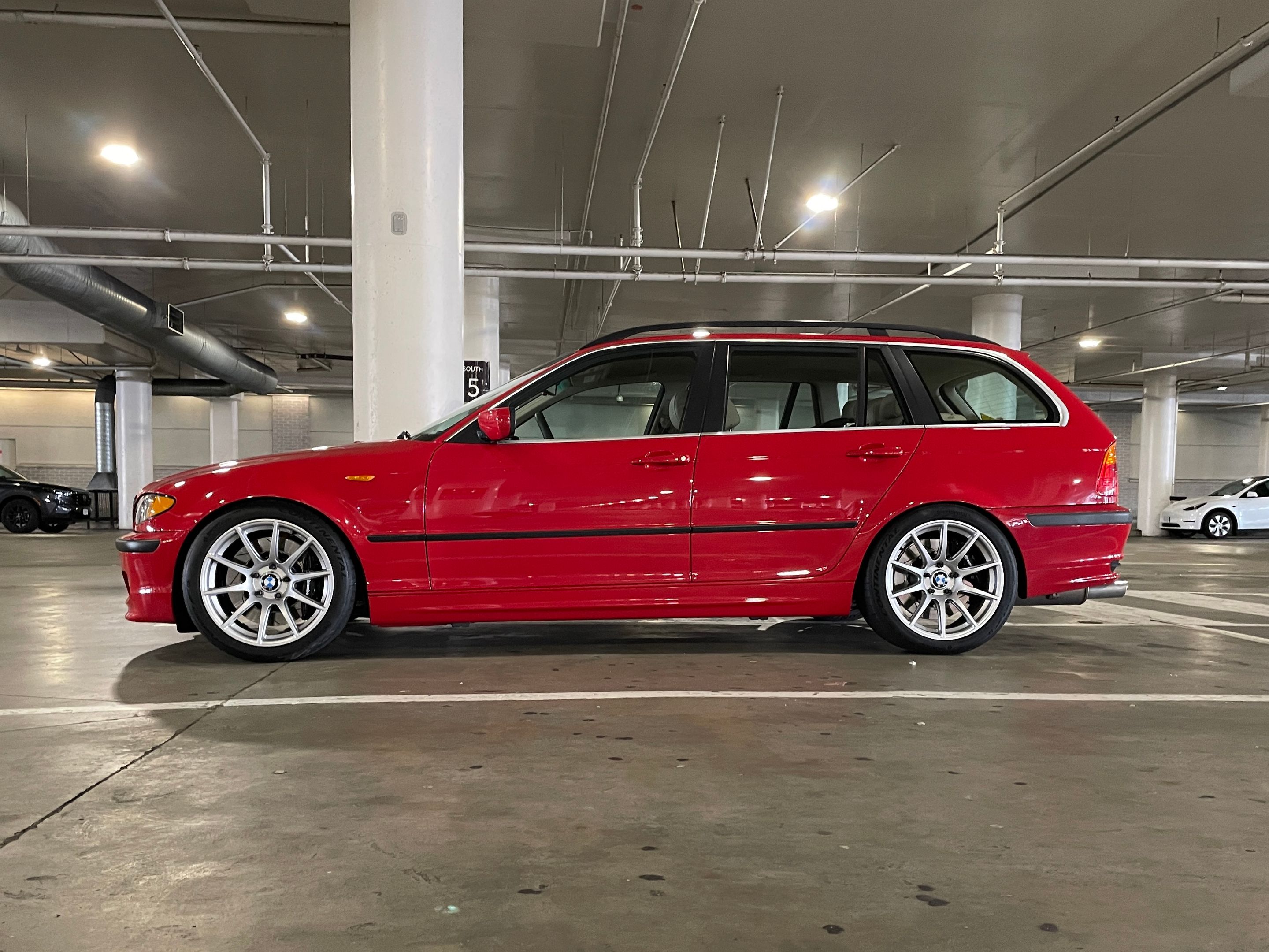 Red BMW E46 3 Series with 18" SM-10 Apex wheels in Race Silver