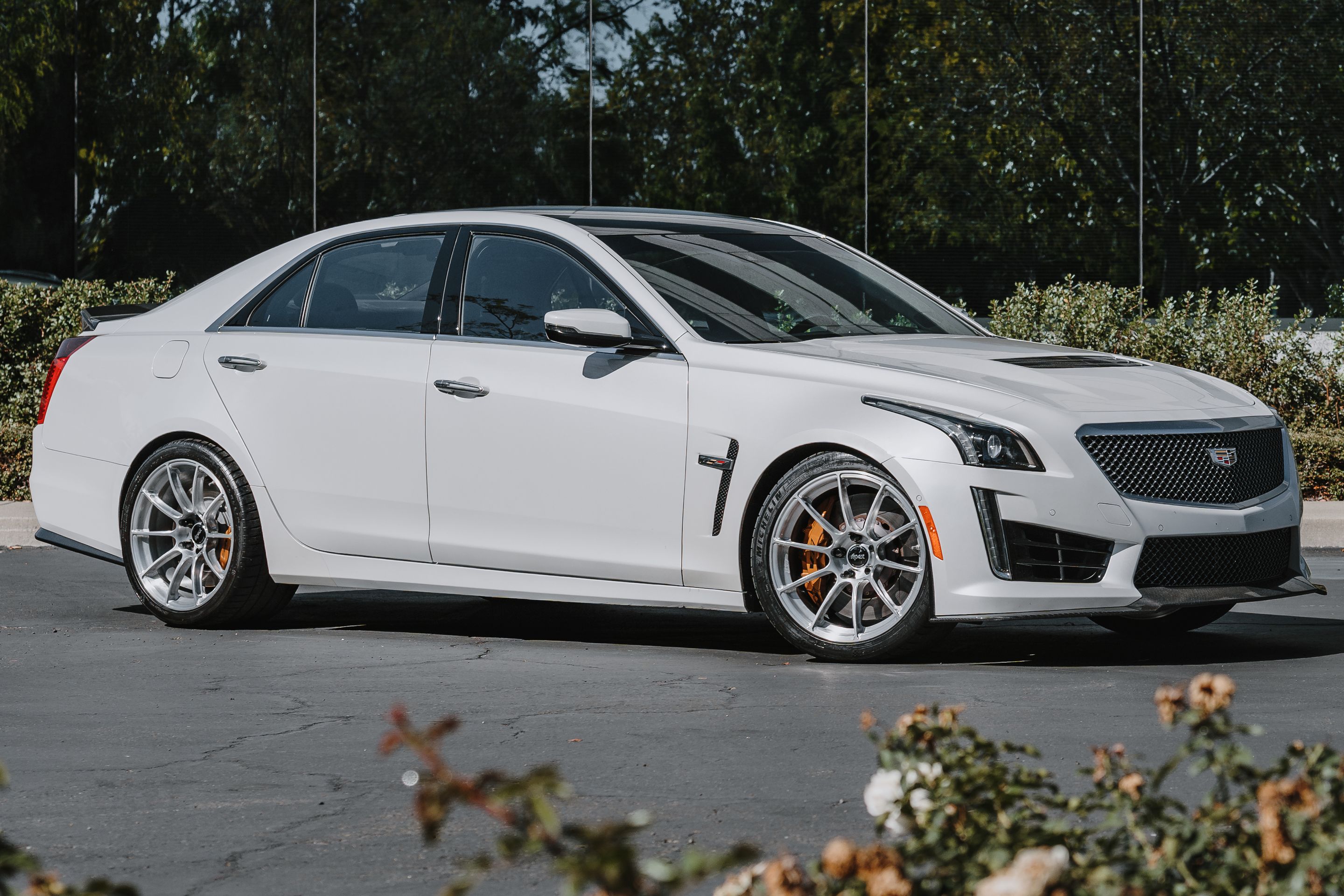 White Cadillac Gen 3 CTS-V with 19" SM-10RS Apex wheels in Brushed Clear