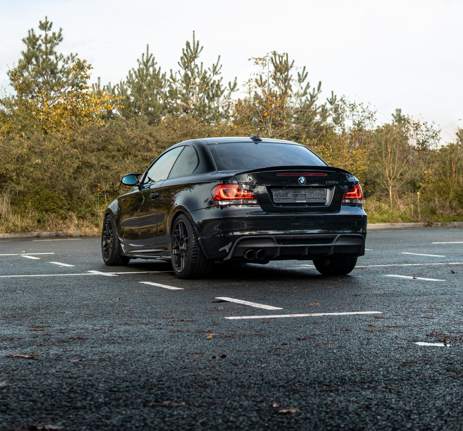 Black BMW E82 Coupe 1 Series with 18" ARC-8 Apex wheels in Satin Black