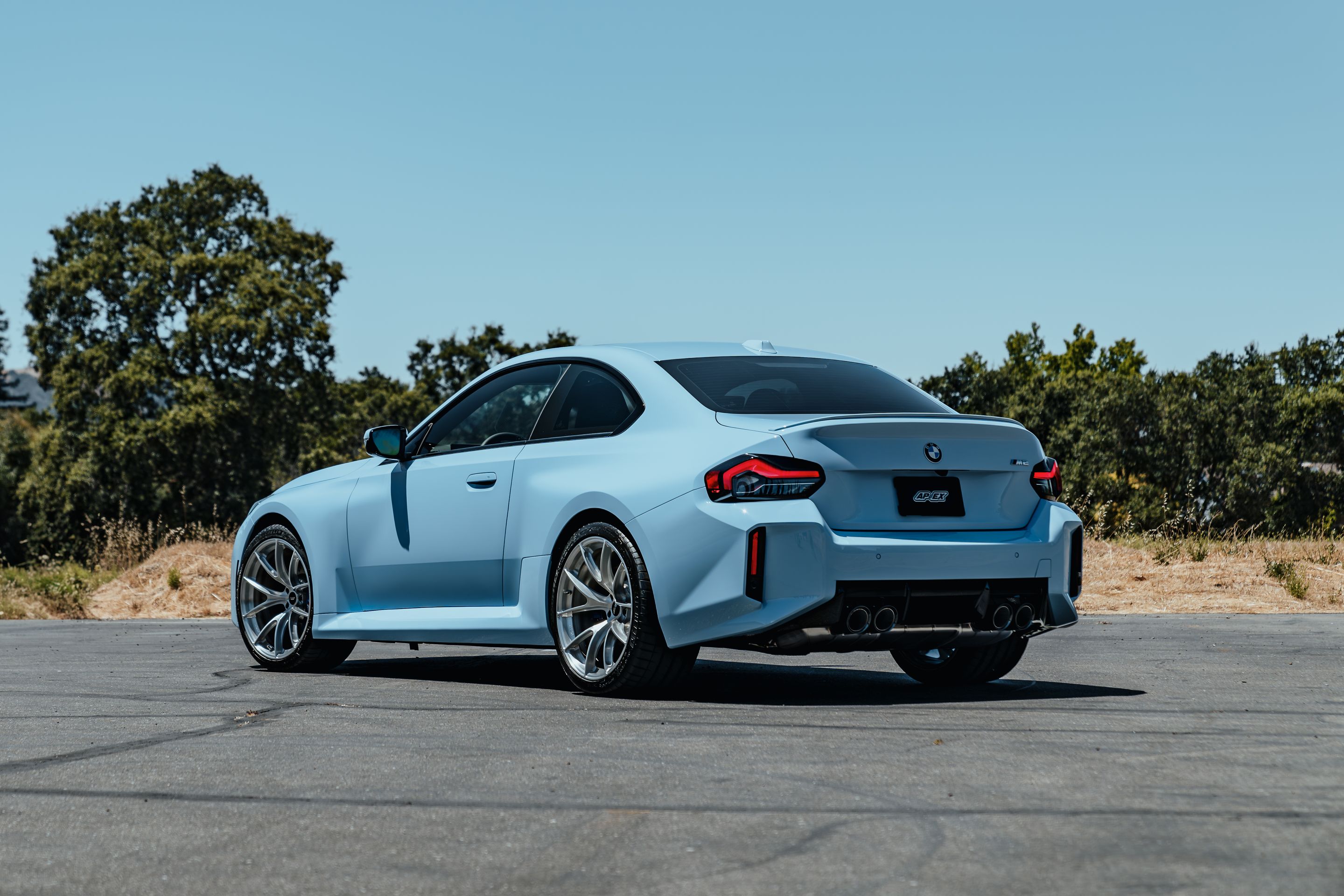 Blue BMW G87 M2 with 20" VS-5RS Apex wheels in Brushed Clear