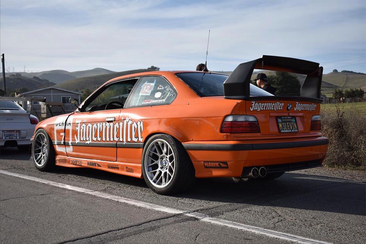 Orange BMW E36 3 Series with 17" ARC-8 Apex wheels in Hyper Silver