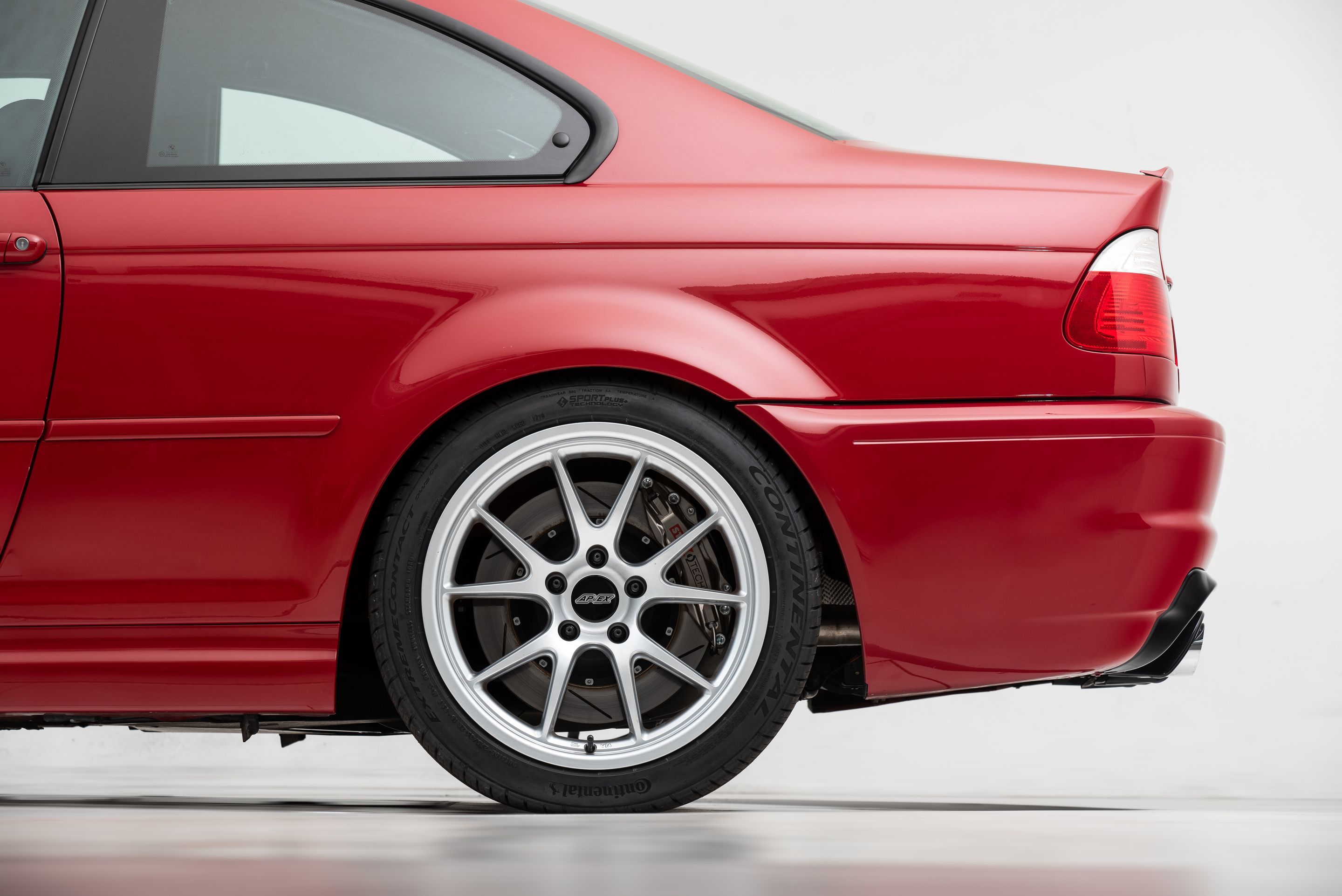 Red BMW E46 M3 with 18" FL-5 Apex wheels in Race Silver
