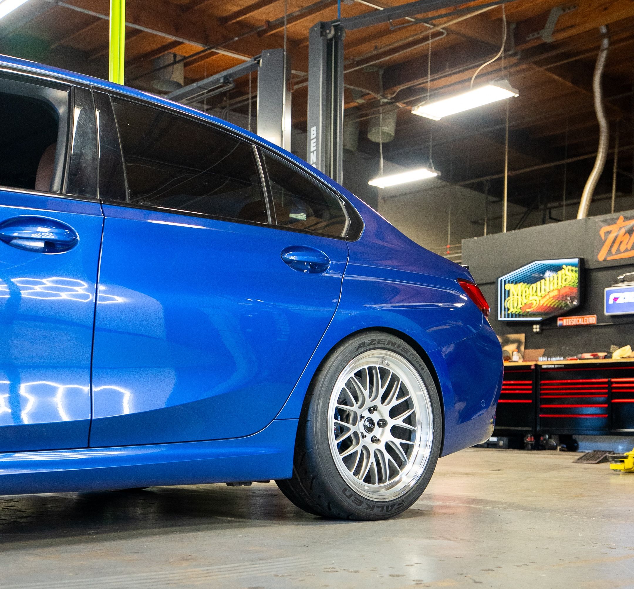 Blue BMW G20 Sedan 3 Series with 19" ML-10RT Apex wheels in Machined Lip Race Silver