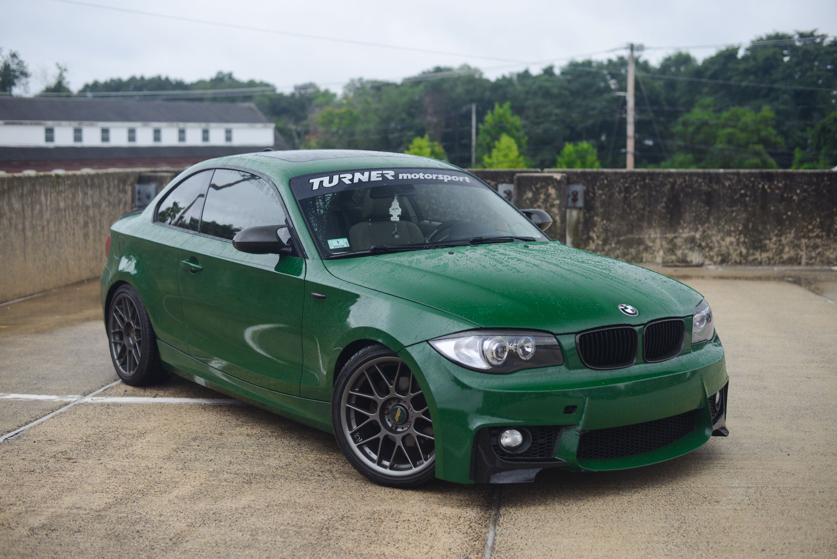 Green BMW E82 Coupe 1 Series with 18" ARC-8 Apex wheels in Anthracite