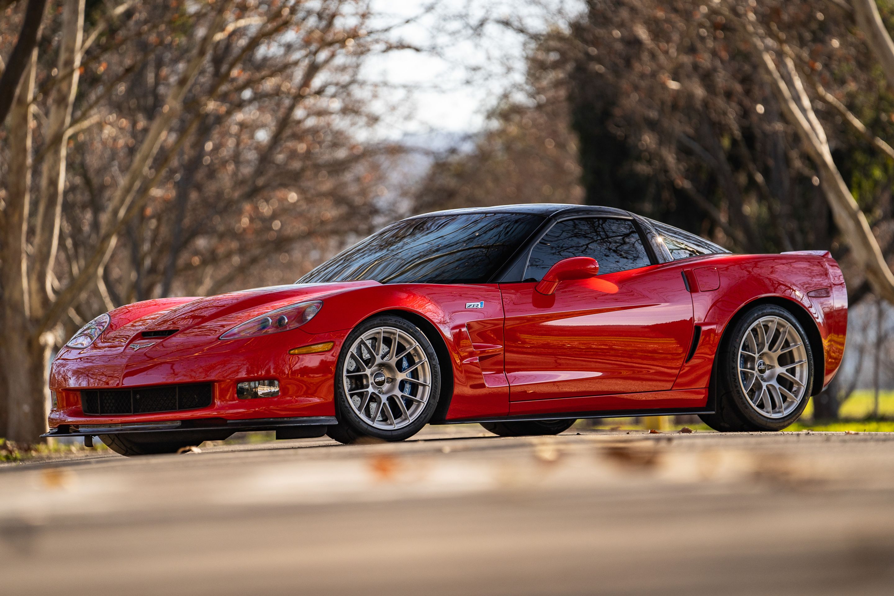 Red Chevrolet C6 Corvette ZR-1 with 18"/19" EC-7RS Apex wheels in Brushed Clear