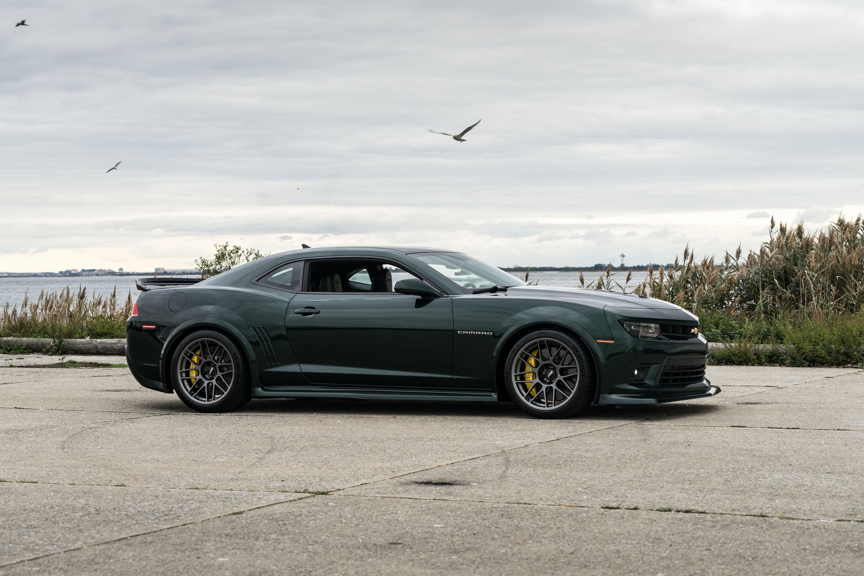 Green Chevrolet 5th Gen Camaro SS with 19" ARC-8 Apex wheels in Anthracite