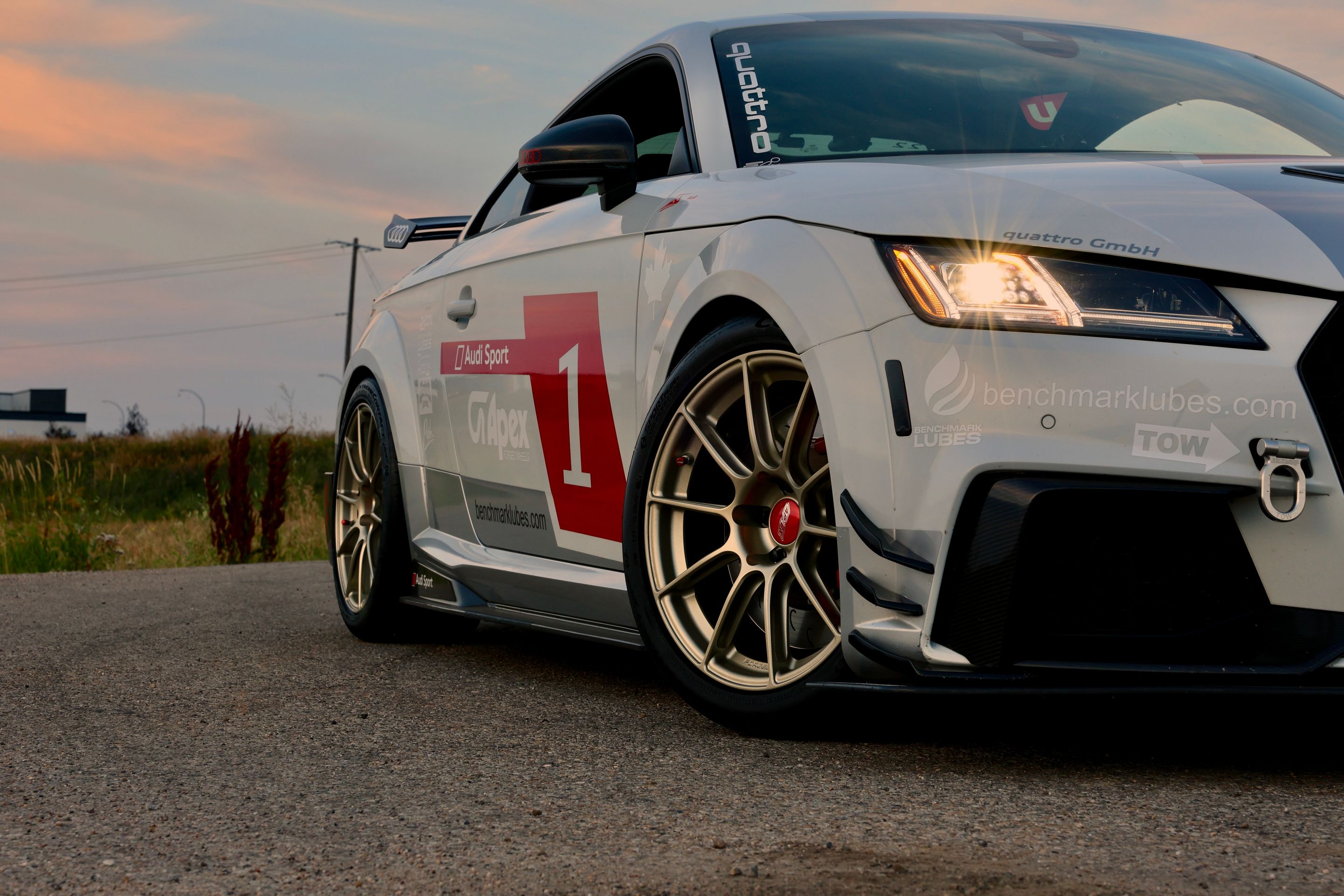 White Audi FV/8S TT RS with 18" SM-10RS Apex wheels in Motorsport Gold