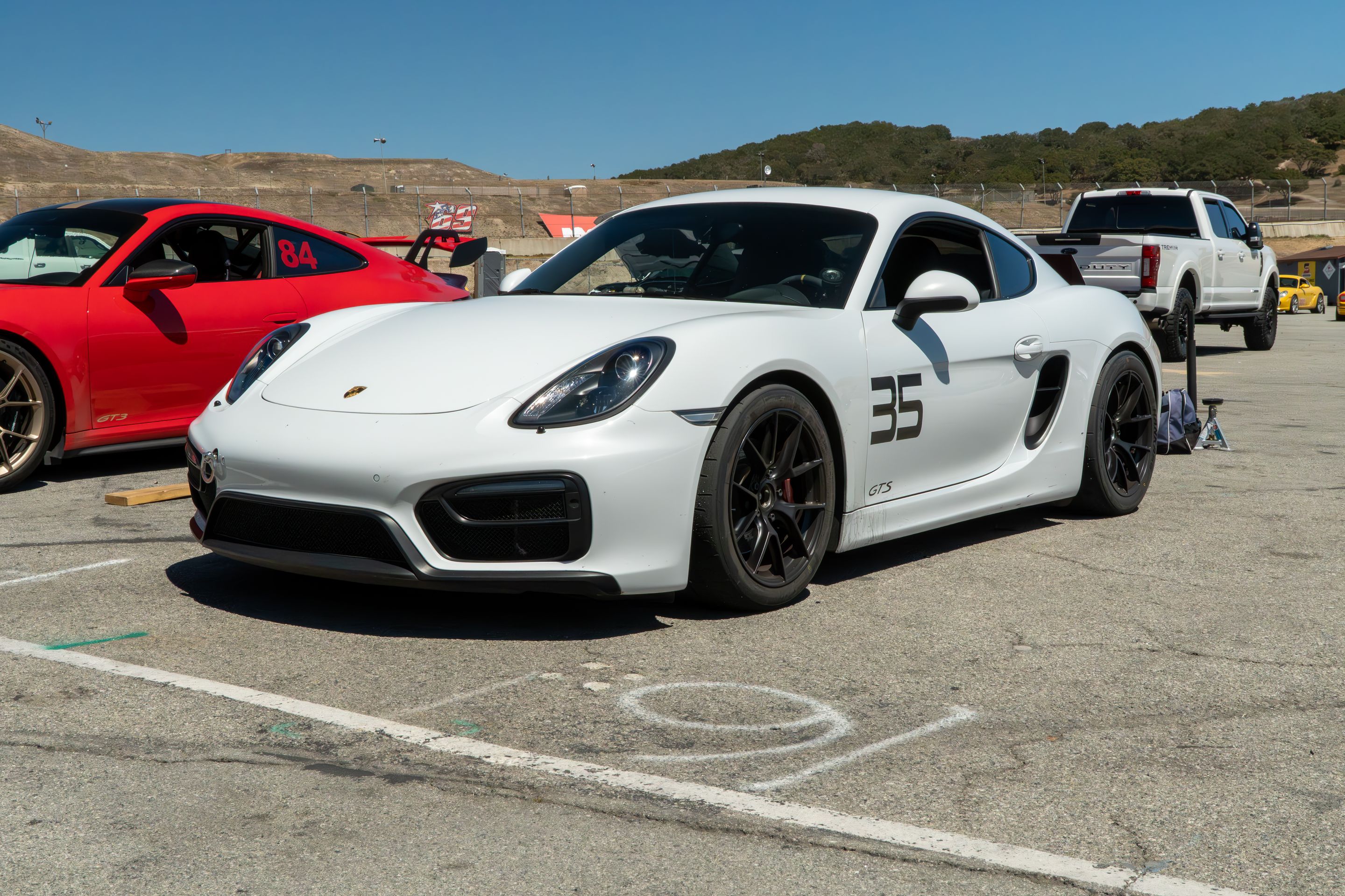 White Porsche 981 Cayman GTS with 18" VS-5RS Apex wheels in Satin Black