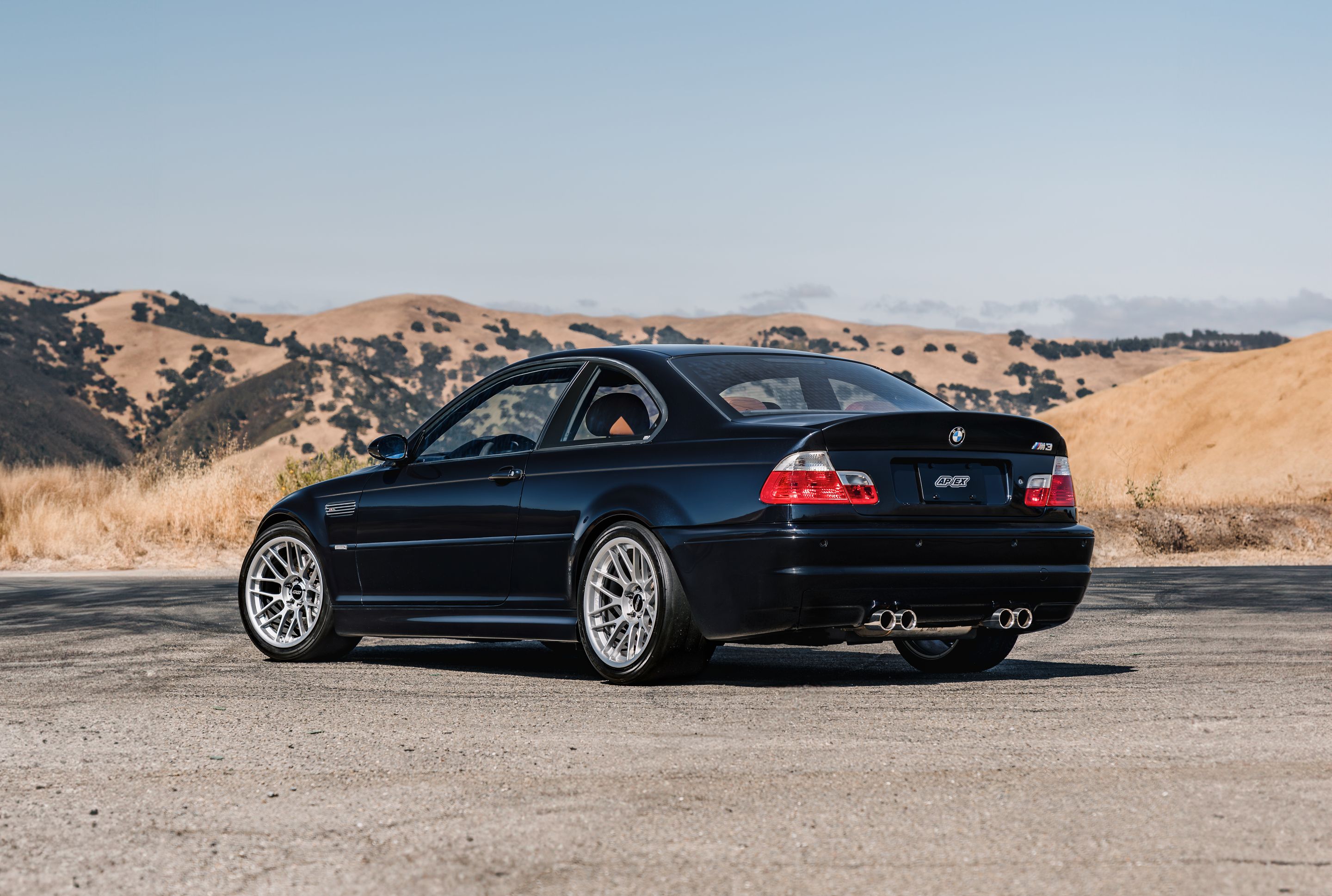 Black BMW E46 M3 with 18" ARC-8RT Apex wheels in Race Silver