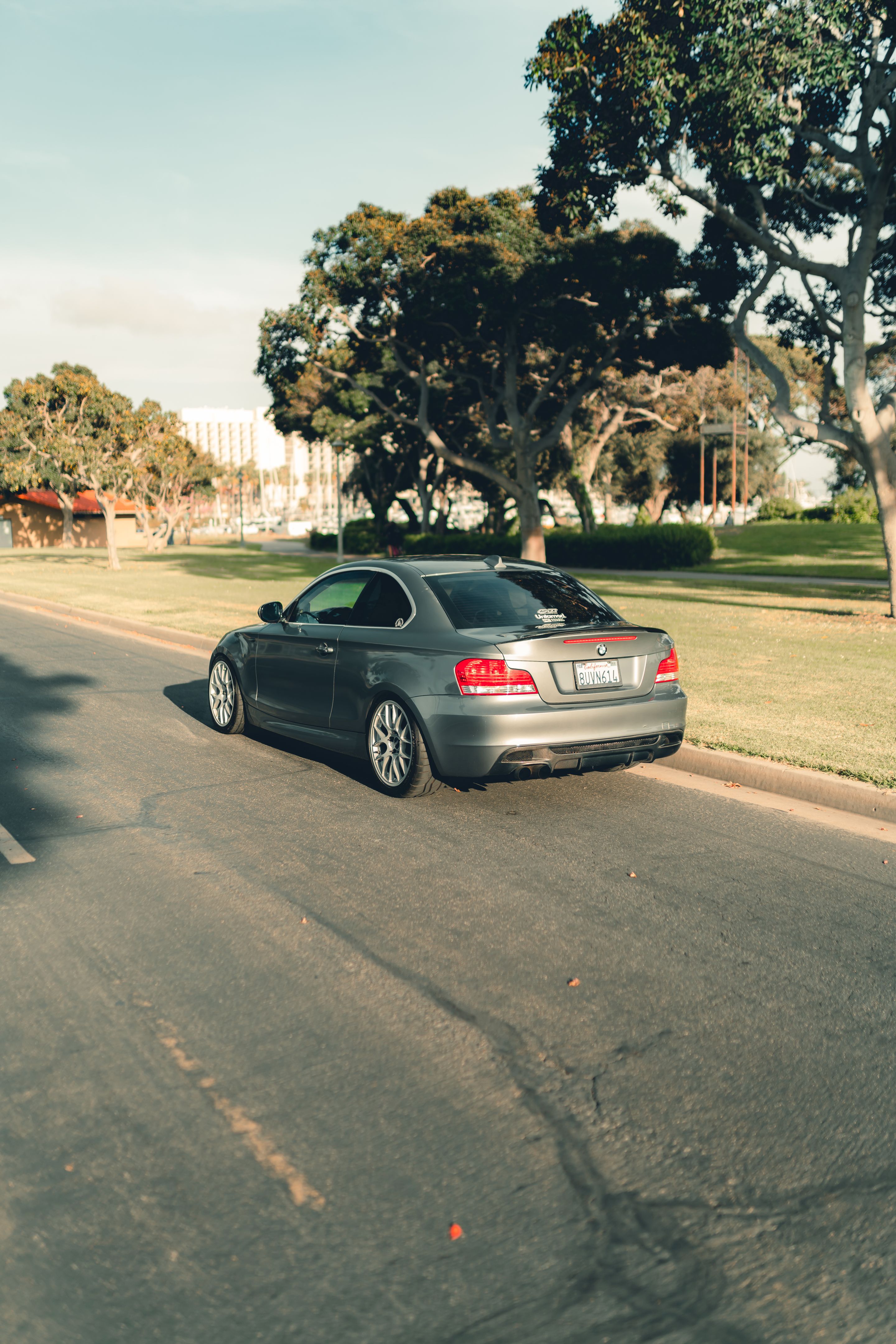 Grey BMW E82 Coupe 1 Series with 18" EC-7 Apex wheels in Race Silver