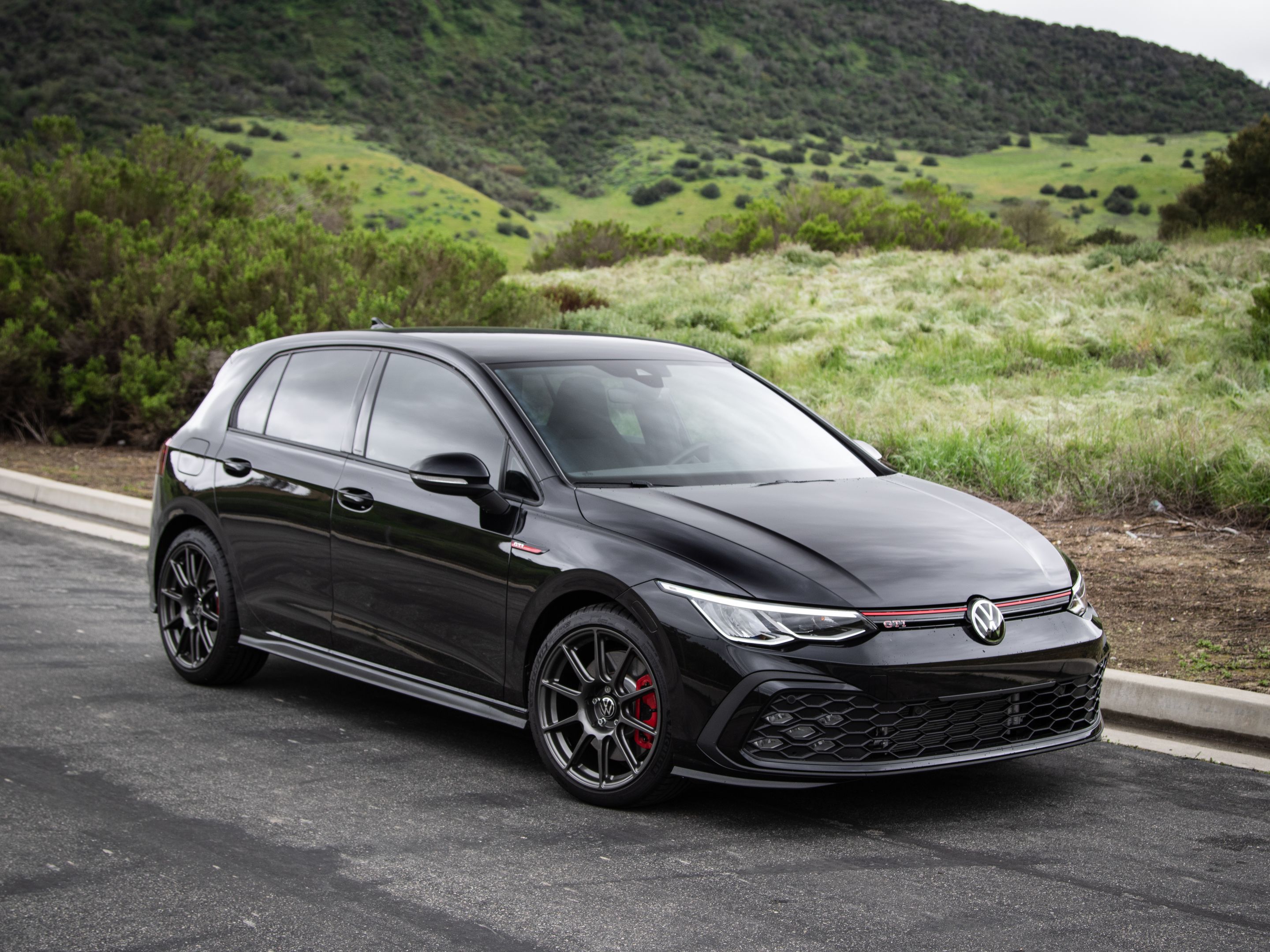 Black VW MK8 GTI with 18" SM-10 Apex wheels in Anthracite