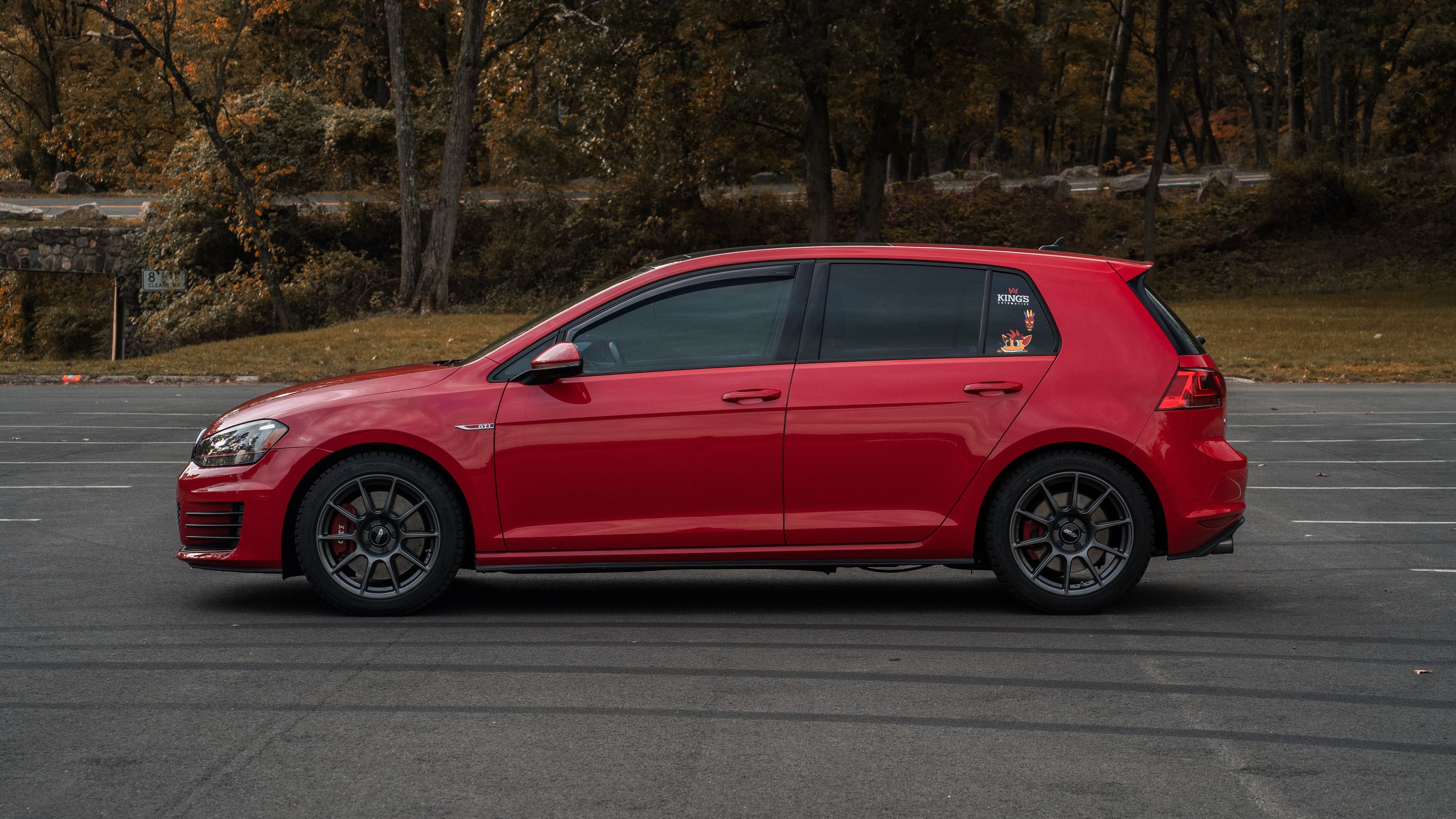 Red VW MK7 GTI with 17" SM-10 Apex wheels in Anthracite