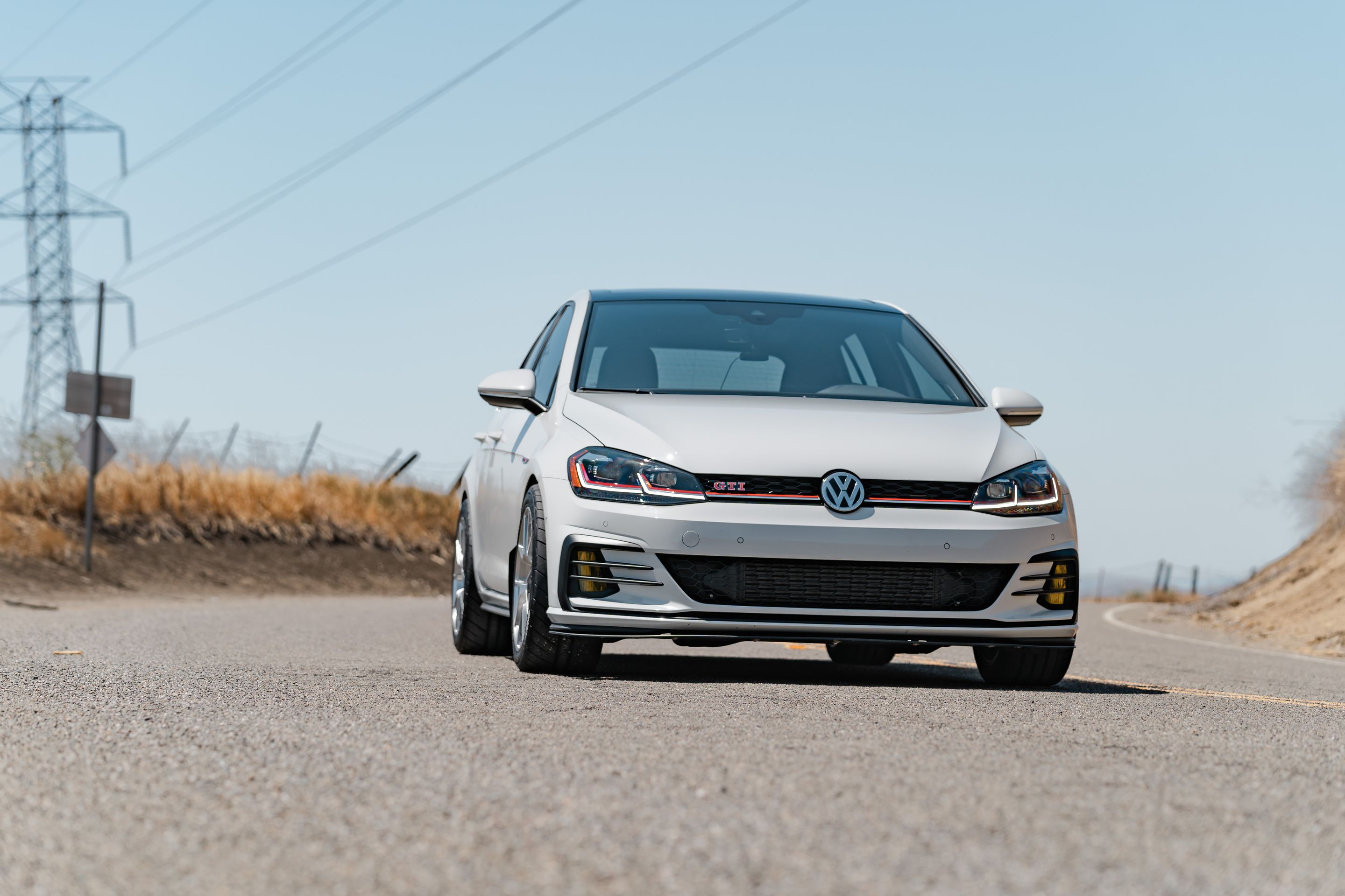 White VW MK7 GTI with 17" VS-5RS Apex wheels in Brushed Clear