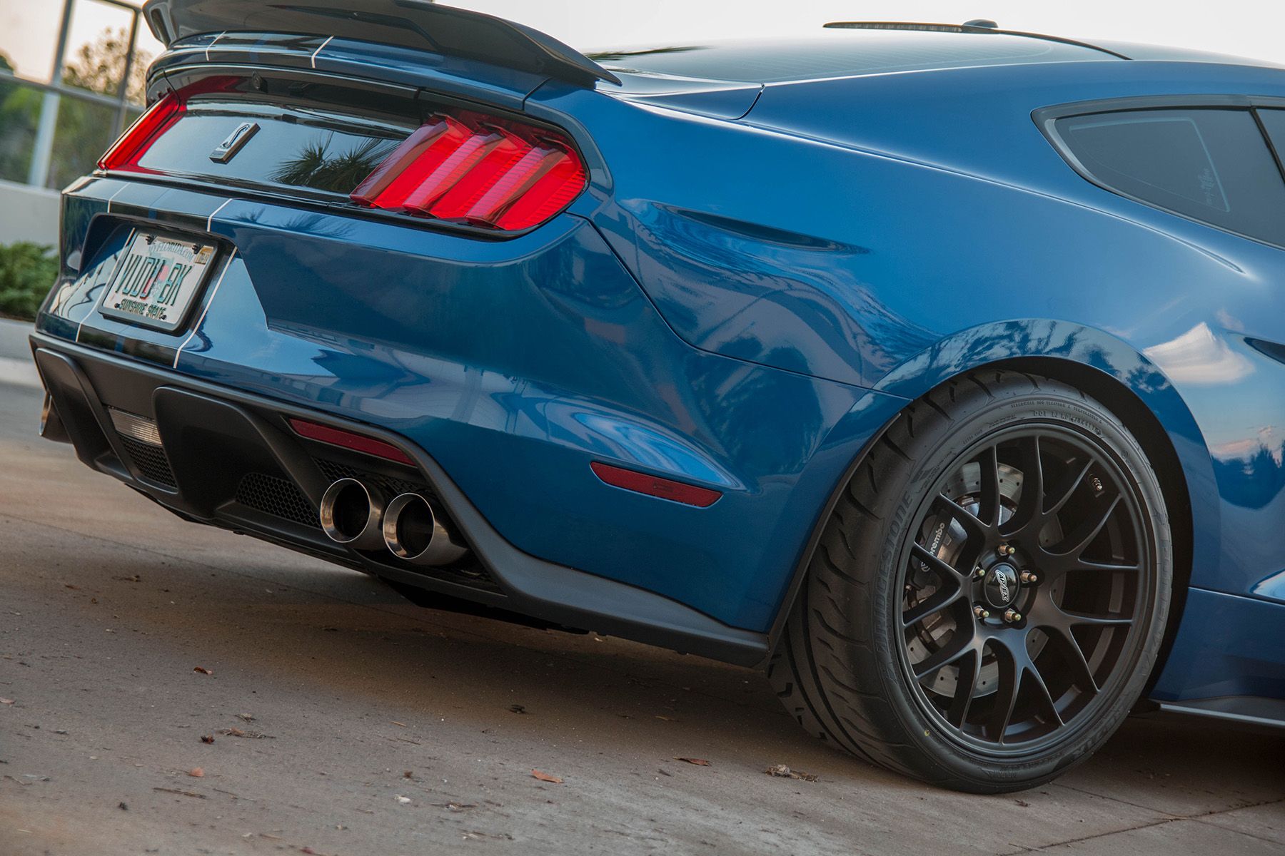 Blue Ford S550 Mustang GT350 with 19" EC-7 Apex wheels in Satin Black