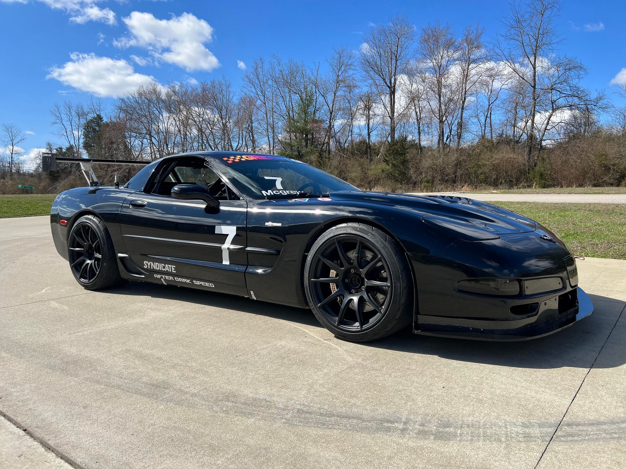 Black Chevrolet C5 Corvette Z06 with 19" SM-10 Apex wheels in Satin Black