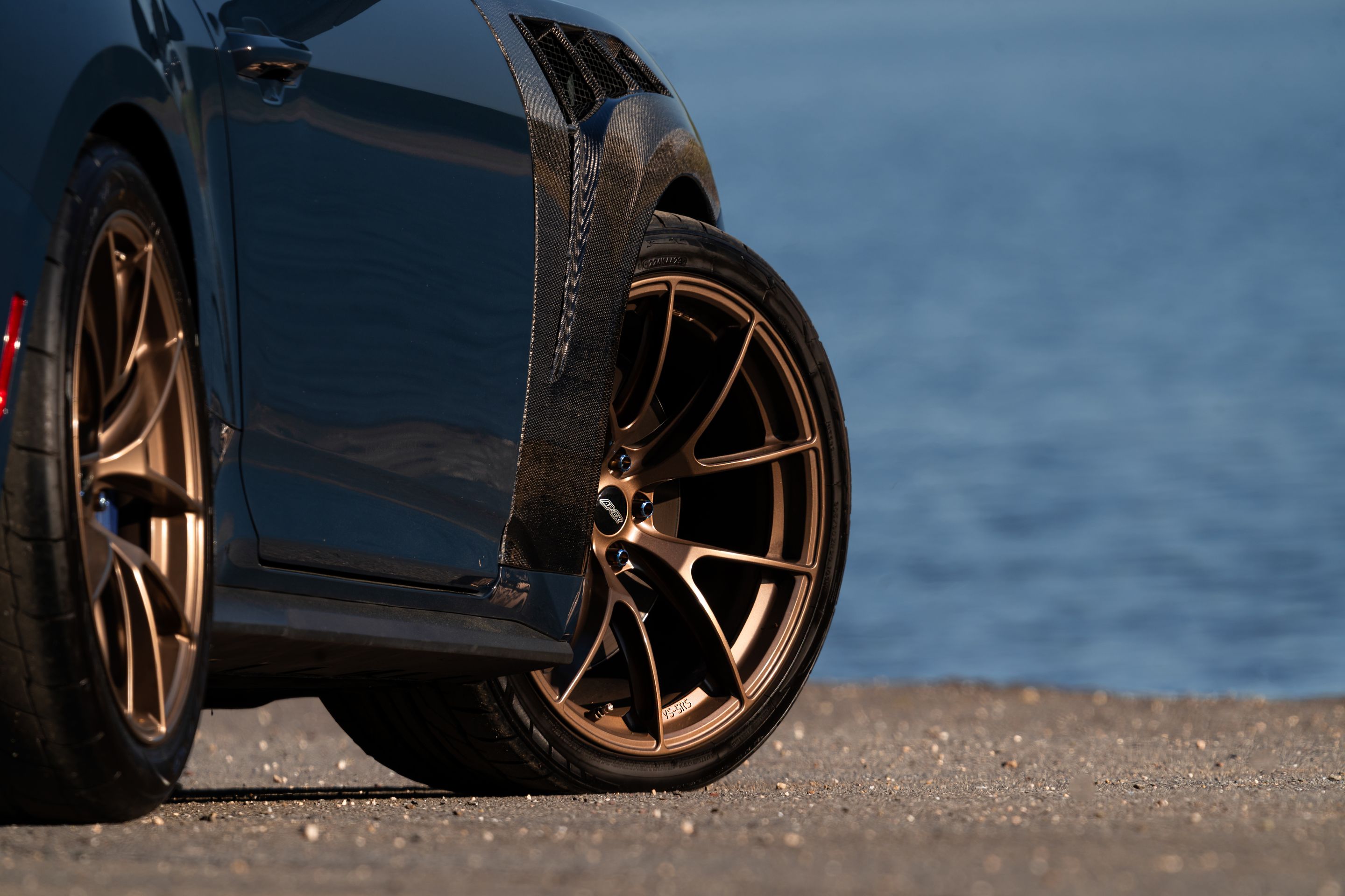 Orange Ford S650 Mustang Dark Horse with 20" VS-5RS Apex wheels in Satin Bronze